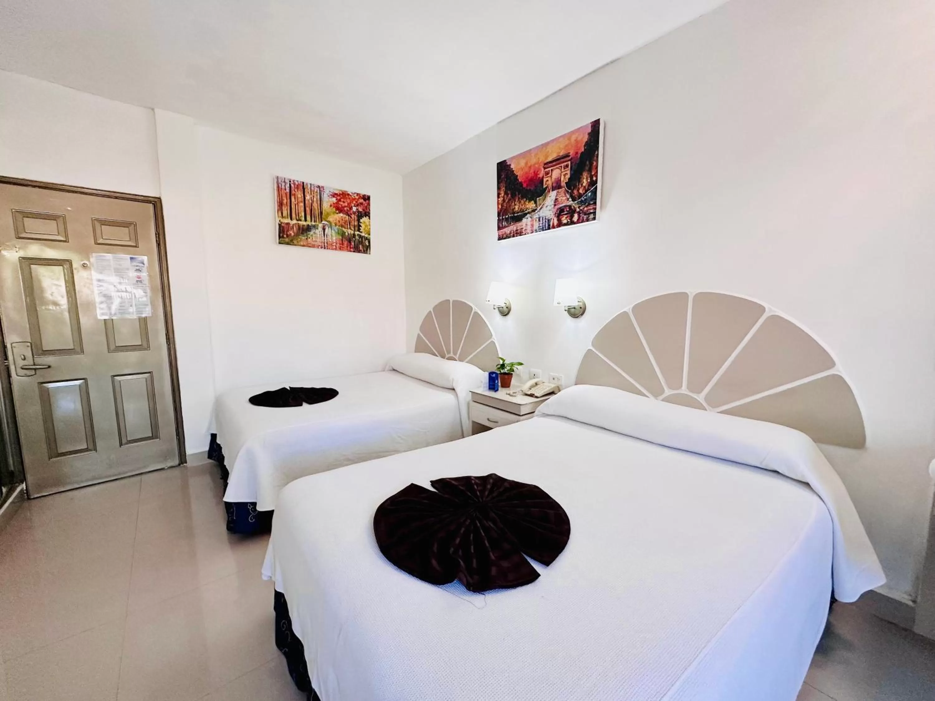 Bed in Hotel Plaza Caribe