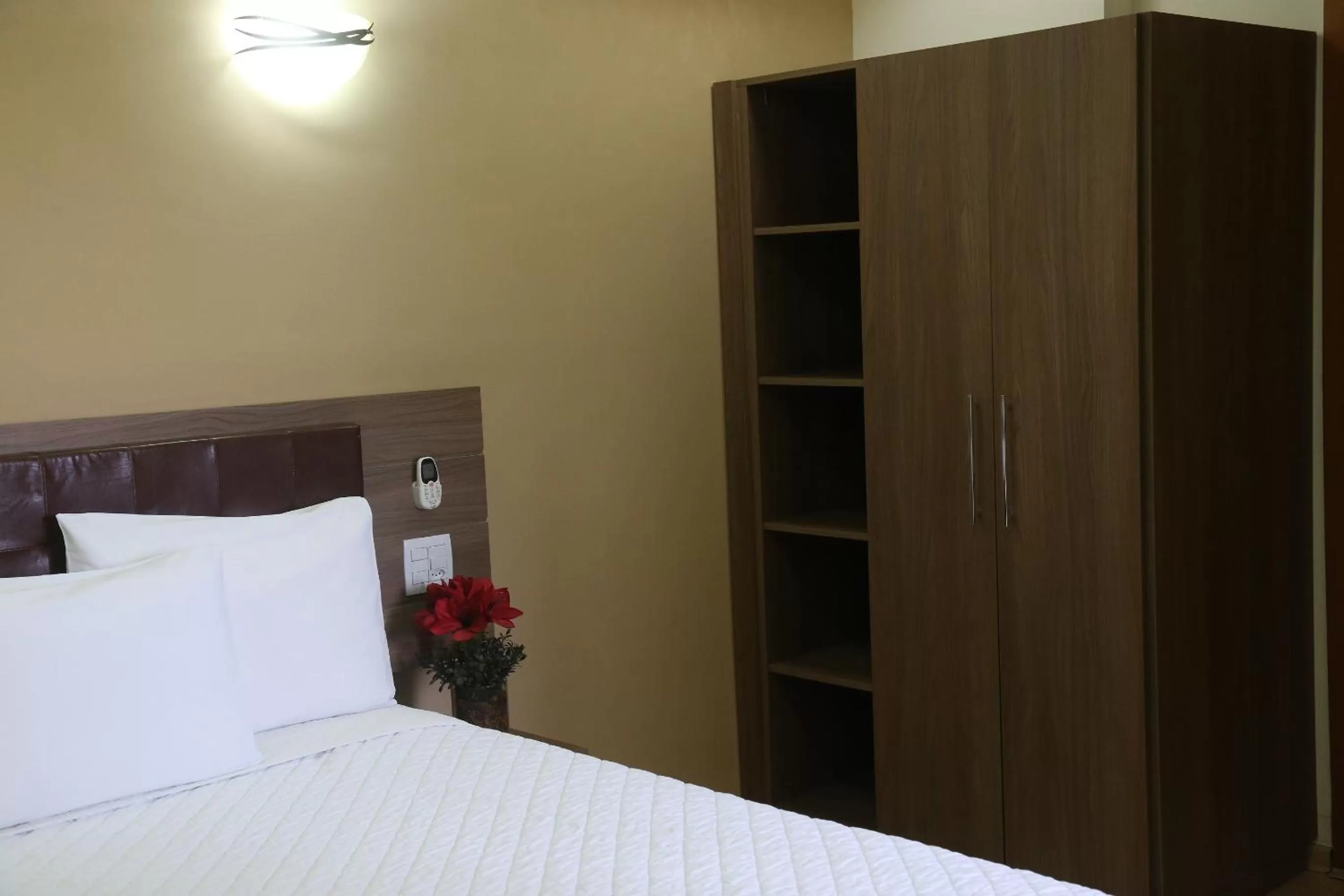 Bed in Larison Executive - by Easy Hotéis