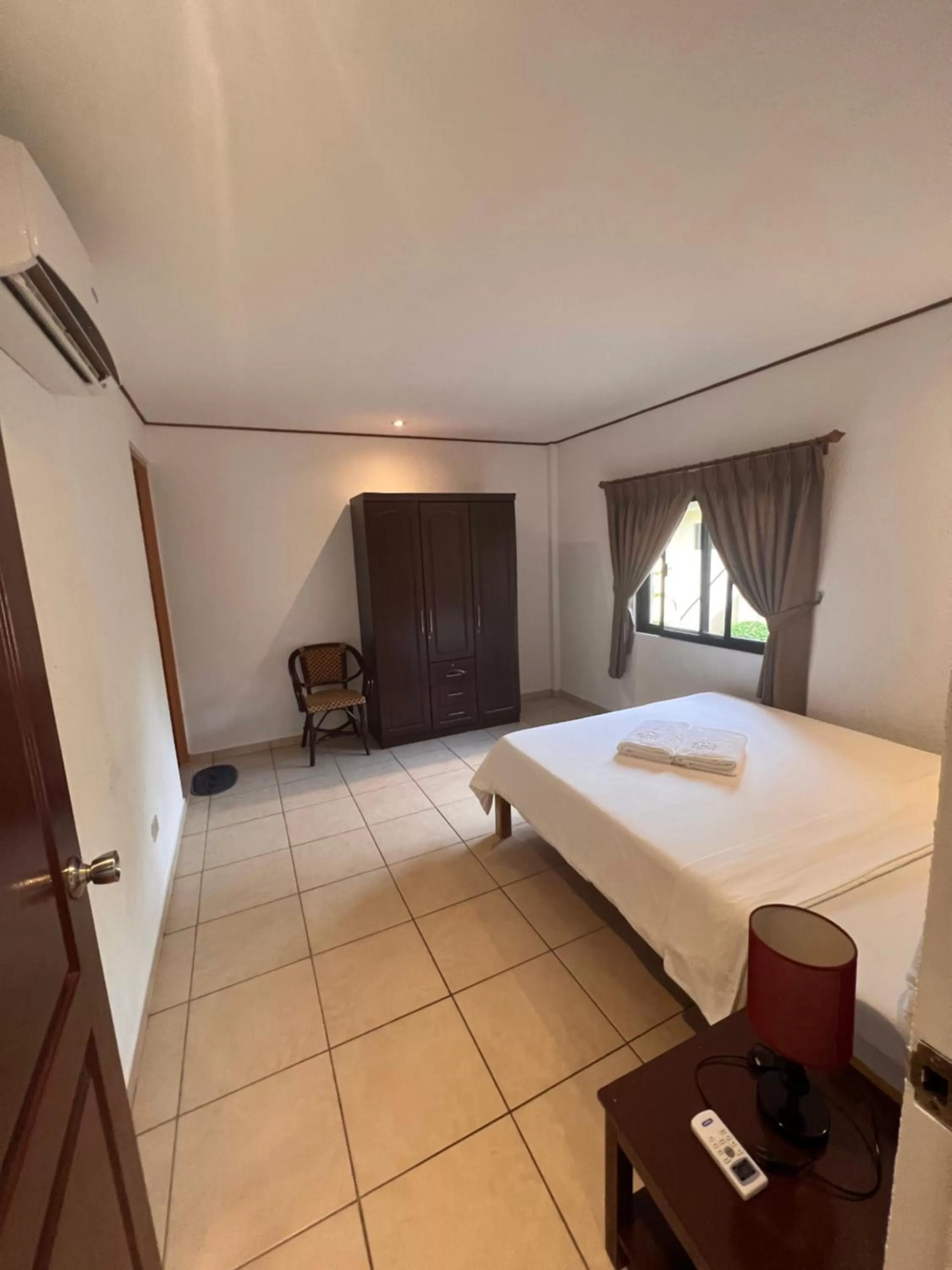 Bed in Alona Swiss Resort