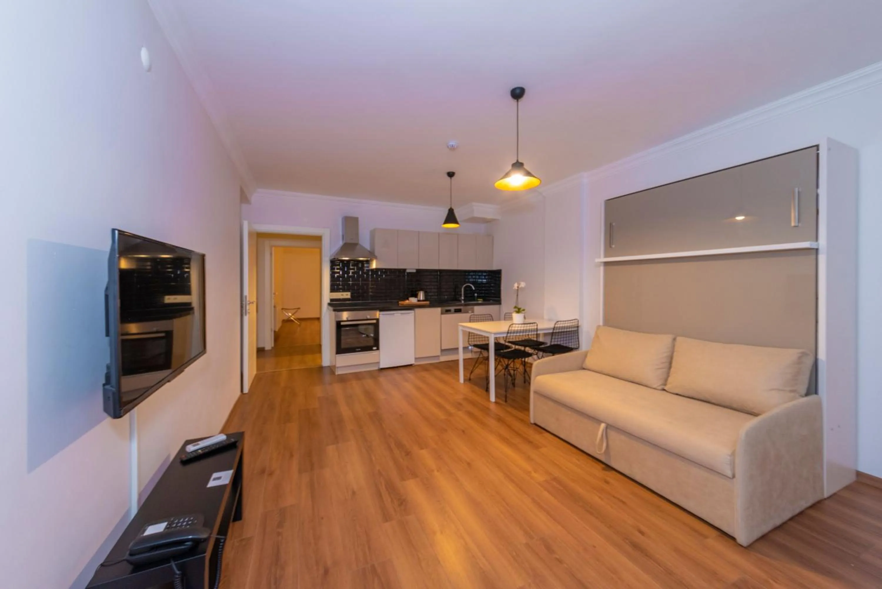 Kitchen or kitchenette in Joy Suites