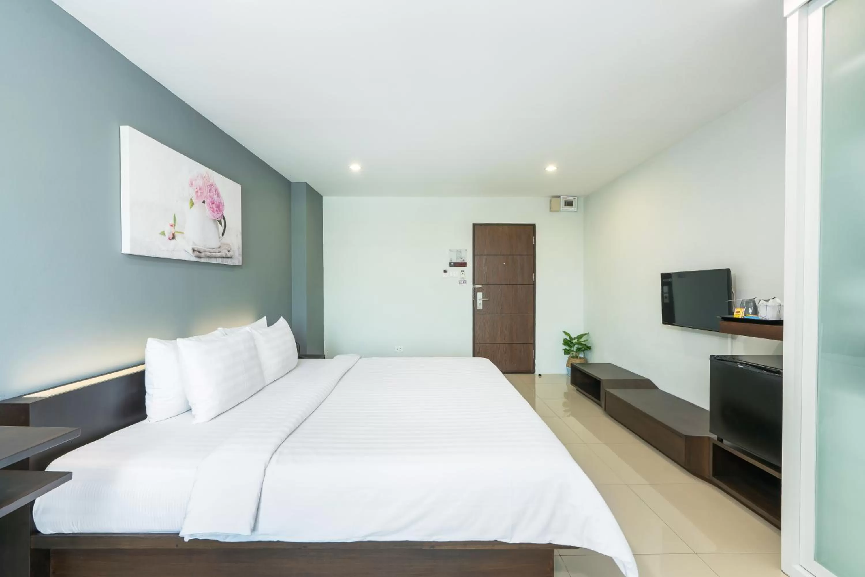 Bed in De Botan Srinakarin Hotel & Residence