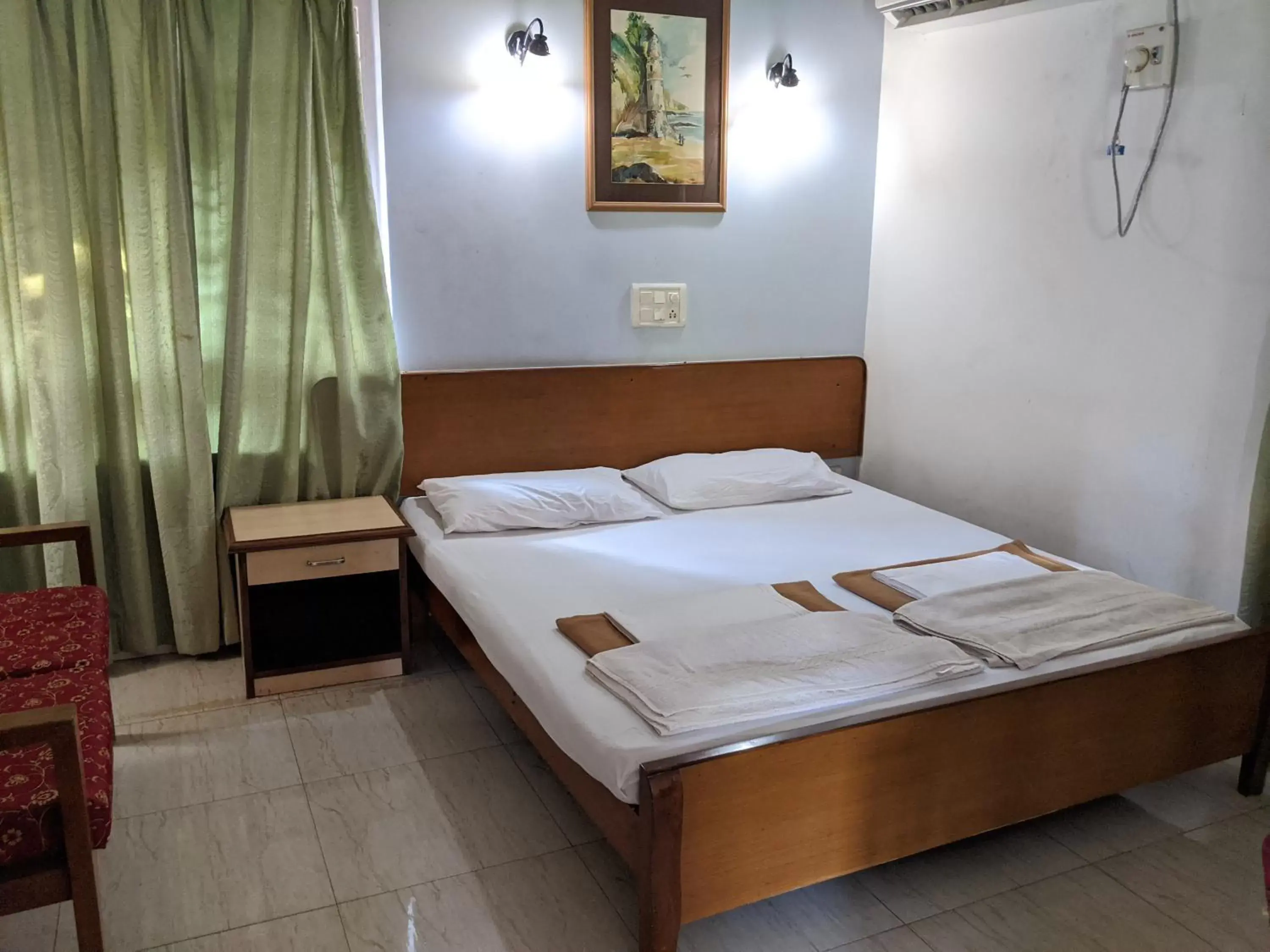 Standard Double or Twin Room with Fan in Farmagudi Residency Standard Double or Twin Room with Fan in Farmagudi Residency