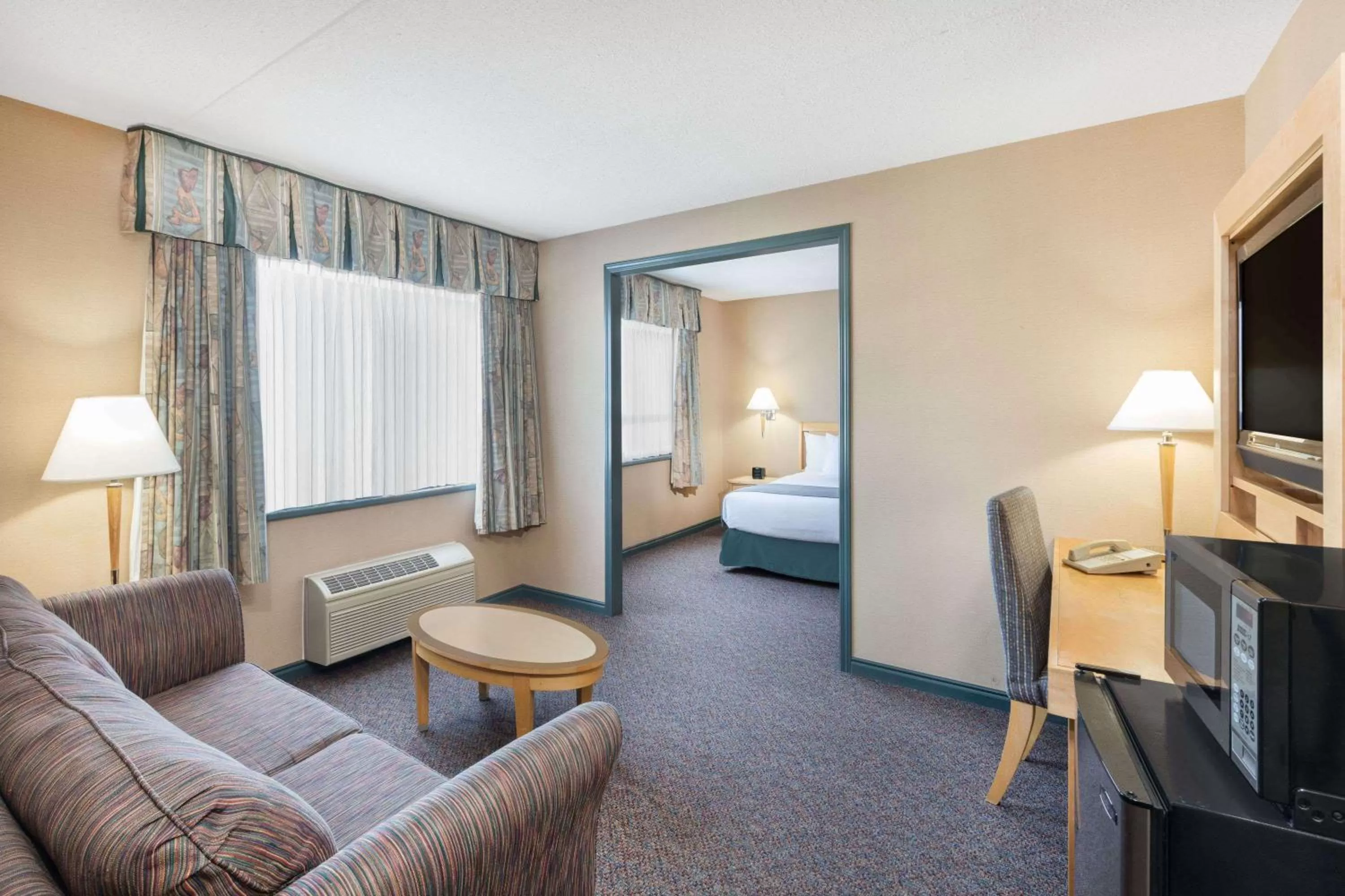 Photo of the whole room, Bed in Ramada Plaza by Wyndham Prince George