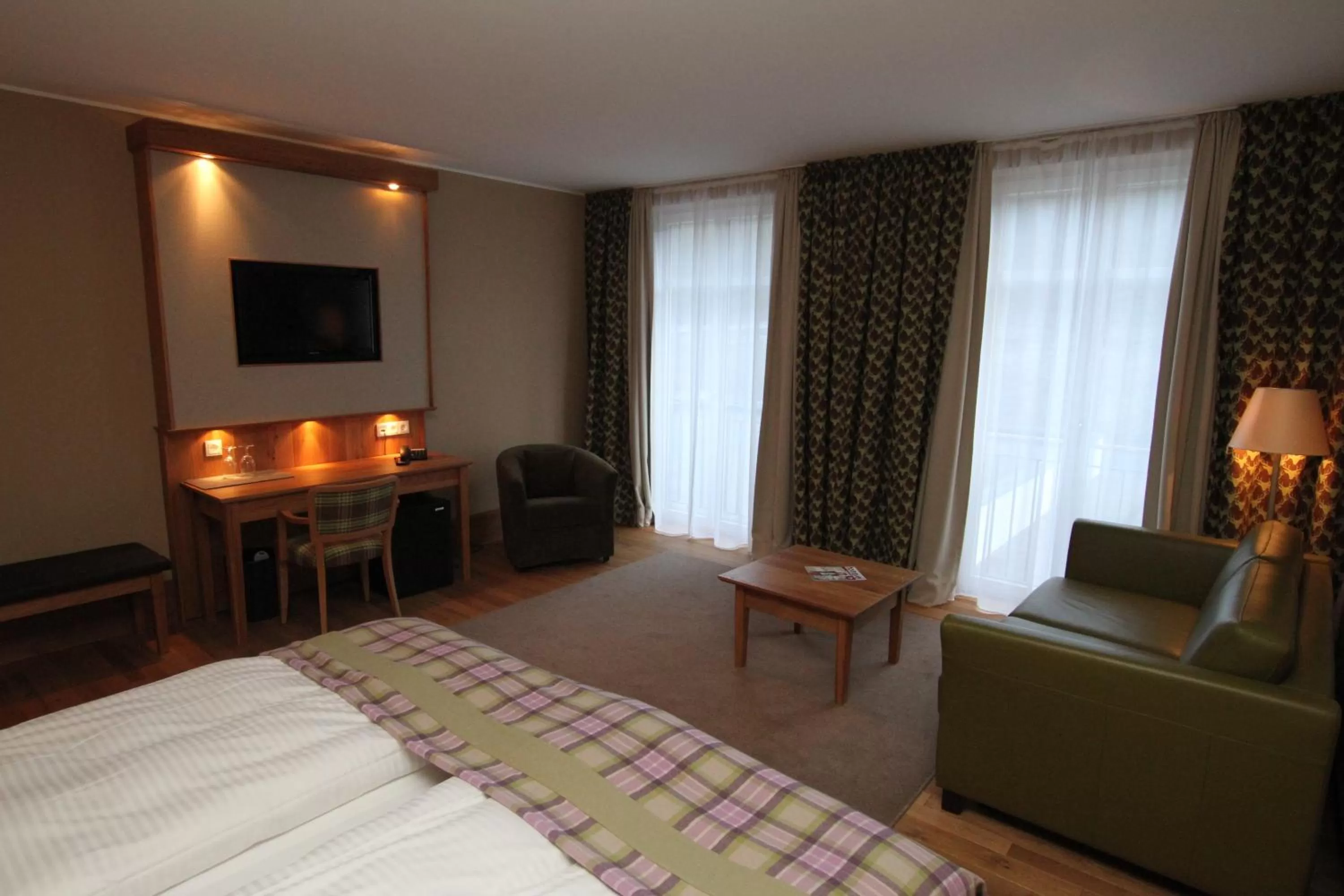 Bedroom, Seating Area in Hotel Rimberg