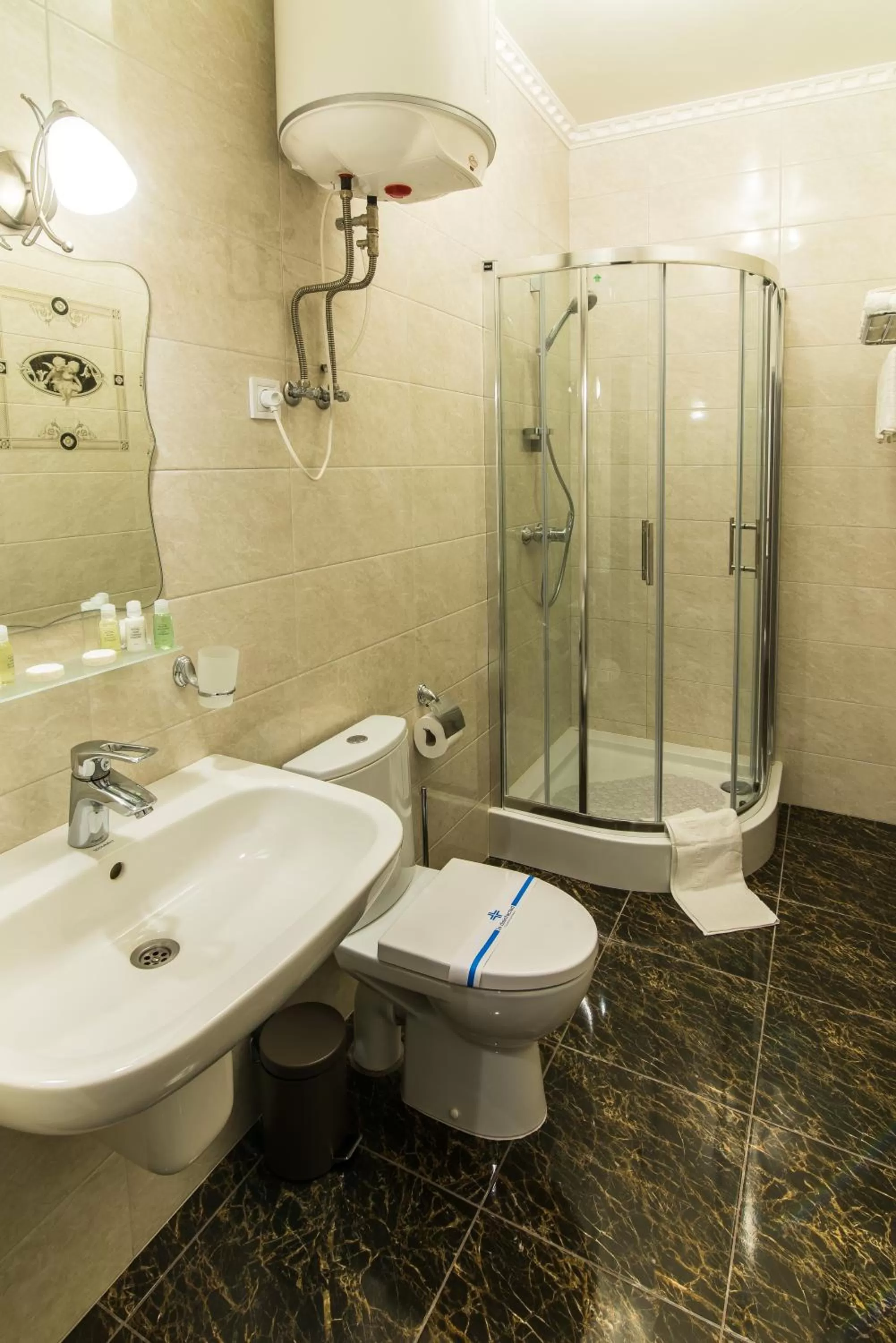 Shower in L.O.Y Family Hotel