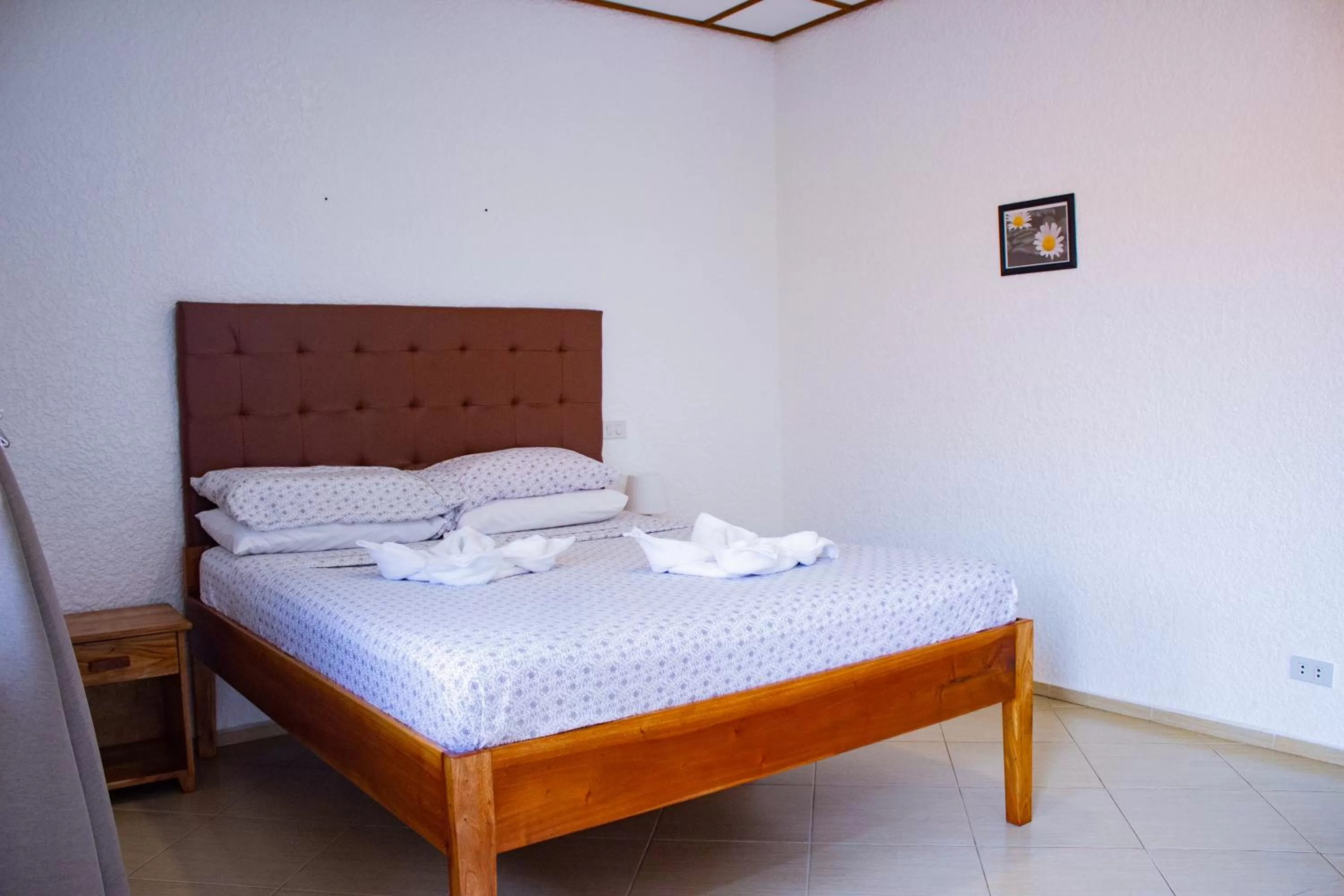 Bed in Jugalis Hotel and Restaurant