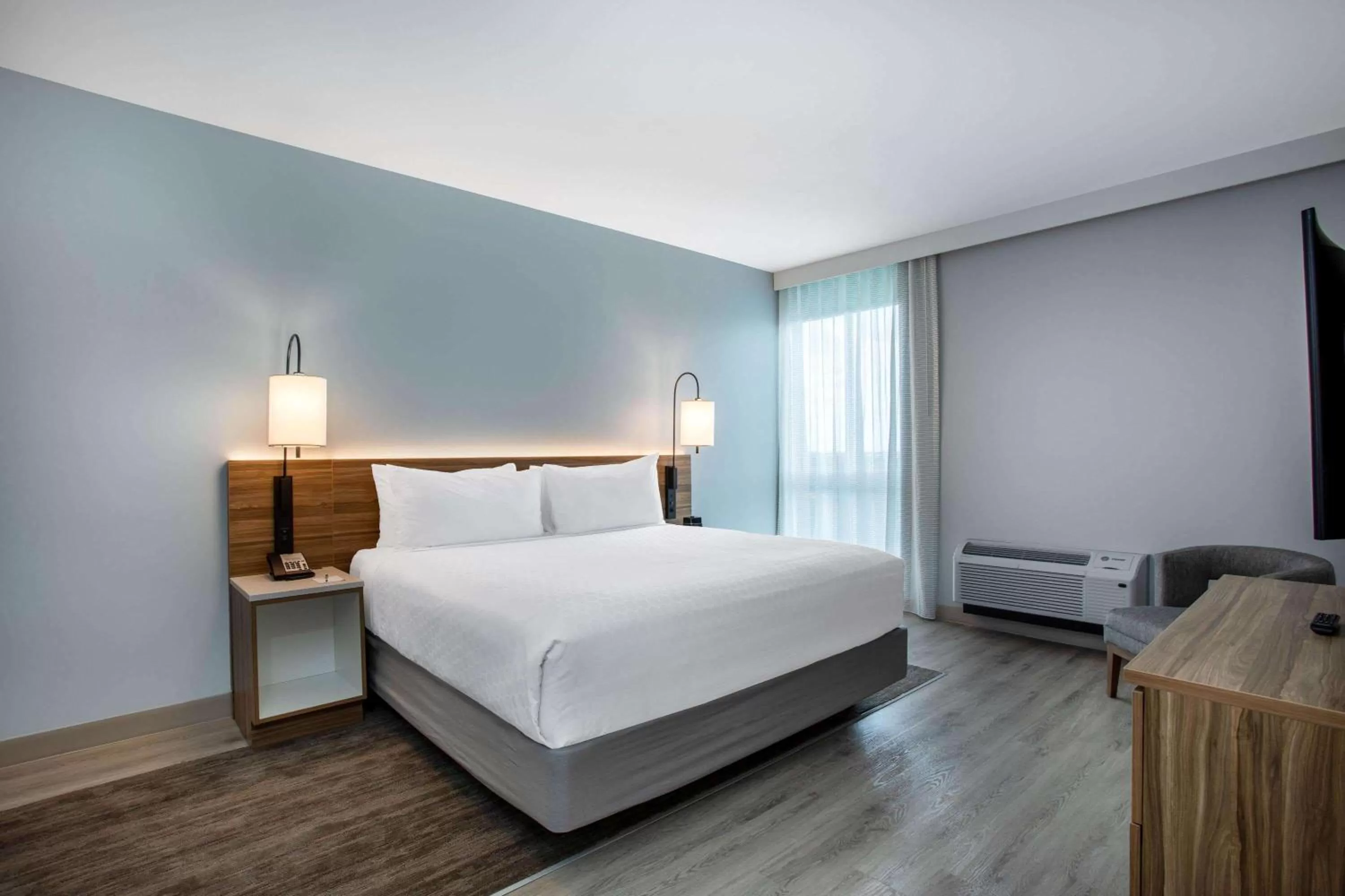 Photo of the whole room, Bed in Wyndham Garden Miami International Airport