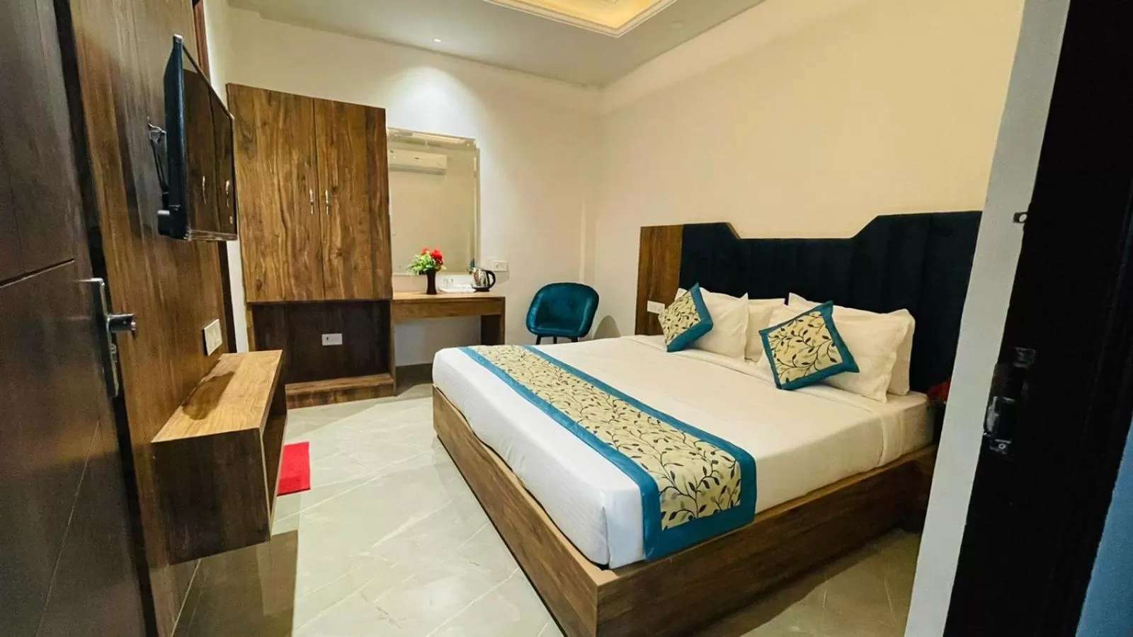 Photo of the whole room in Hotel Dream Town By Cozy Hotels & Resorts