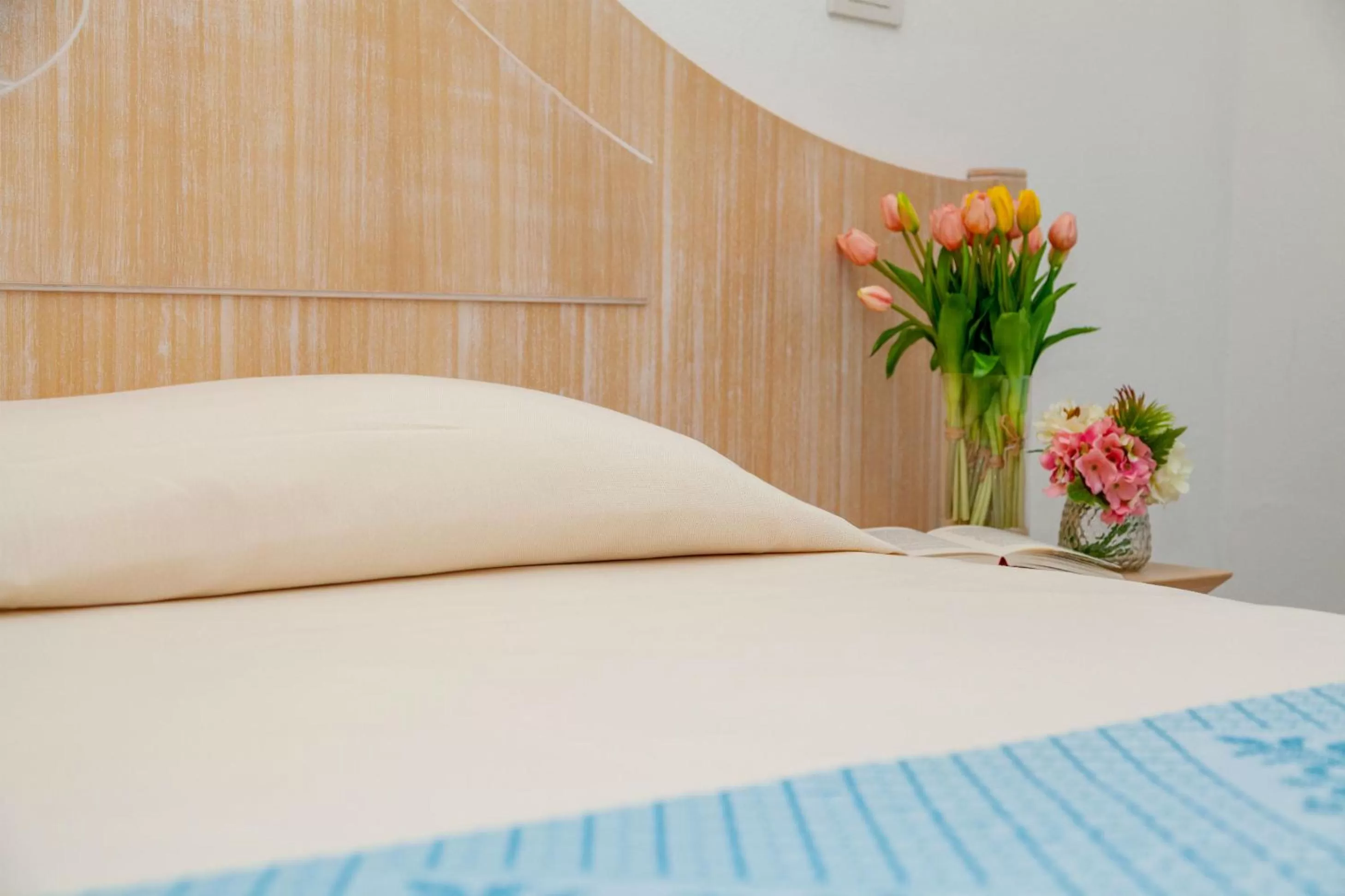 Decorative detail, Bed in Hotel Dei Pini