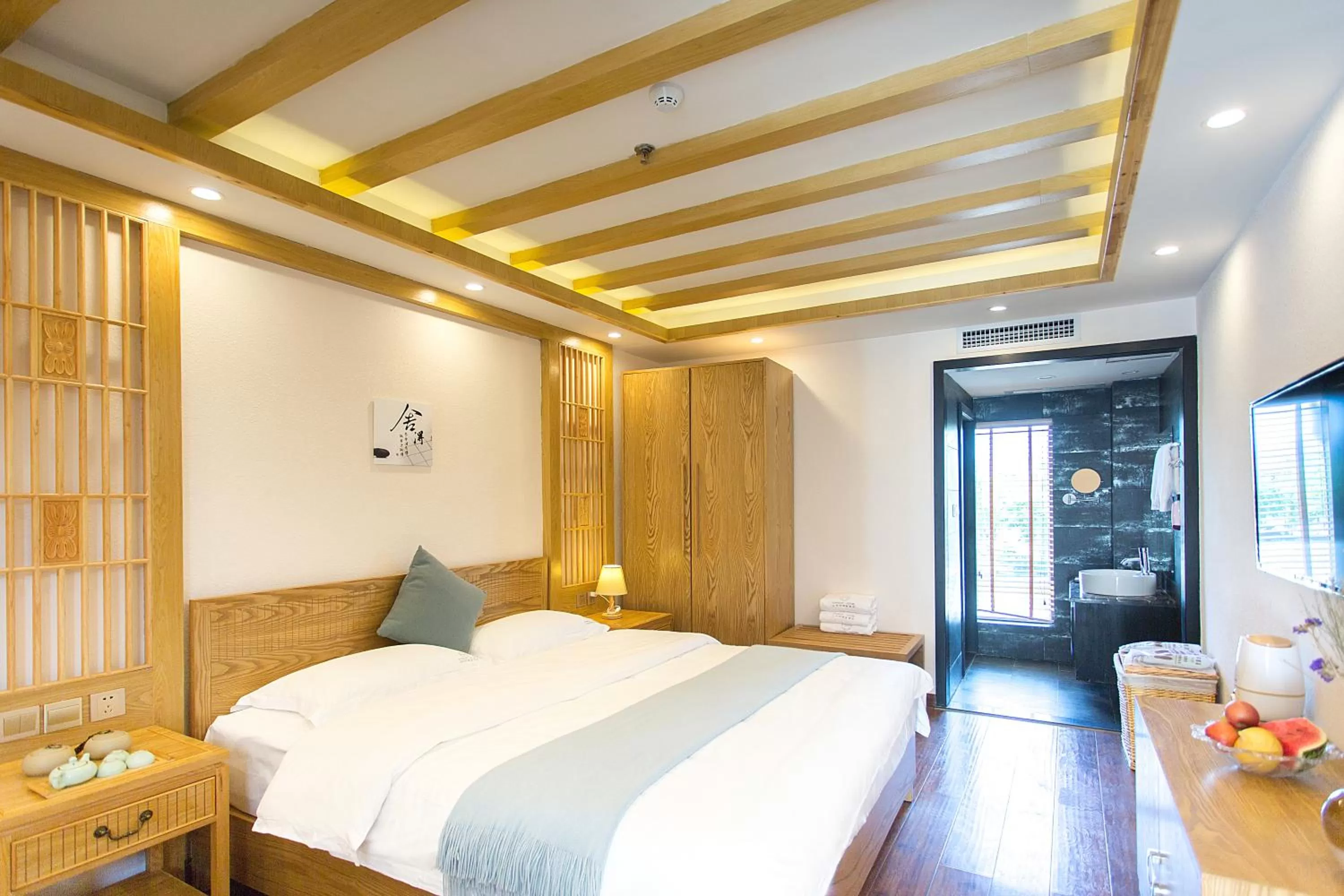 Bed in Lijiang Gemmer Hotel