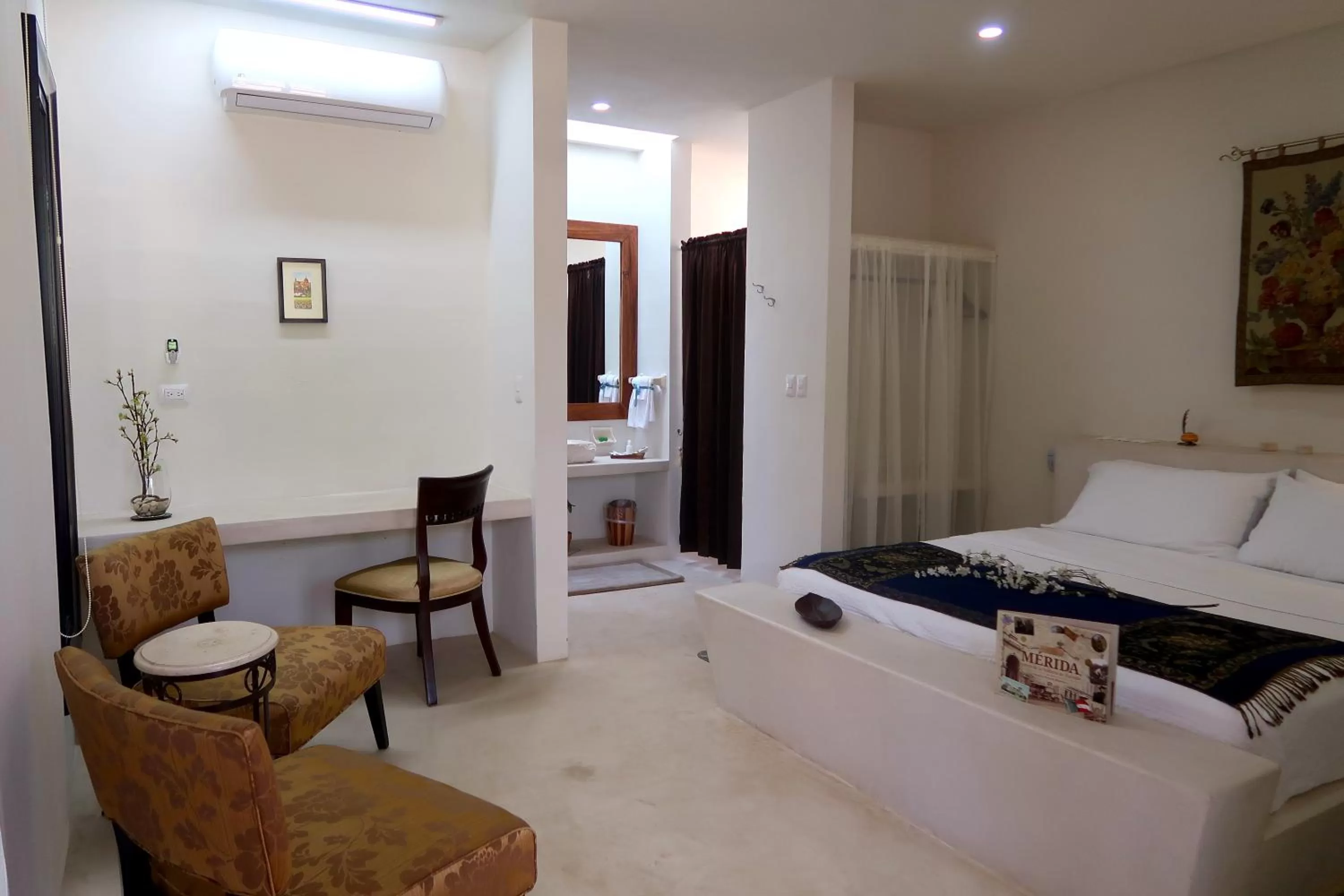 Living room, Bed in Hotel Casa de Campo Conkal Merida