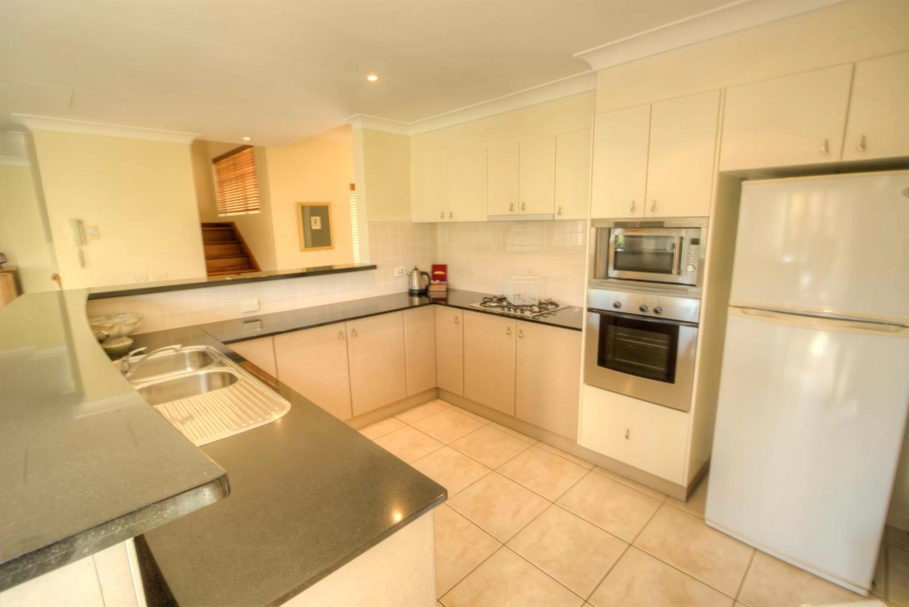 Kitchen or kitchenette in Paradise Links Resort Port Douglas