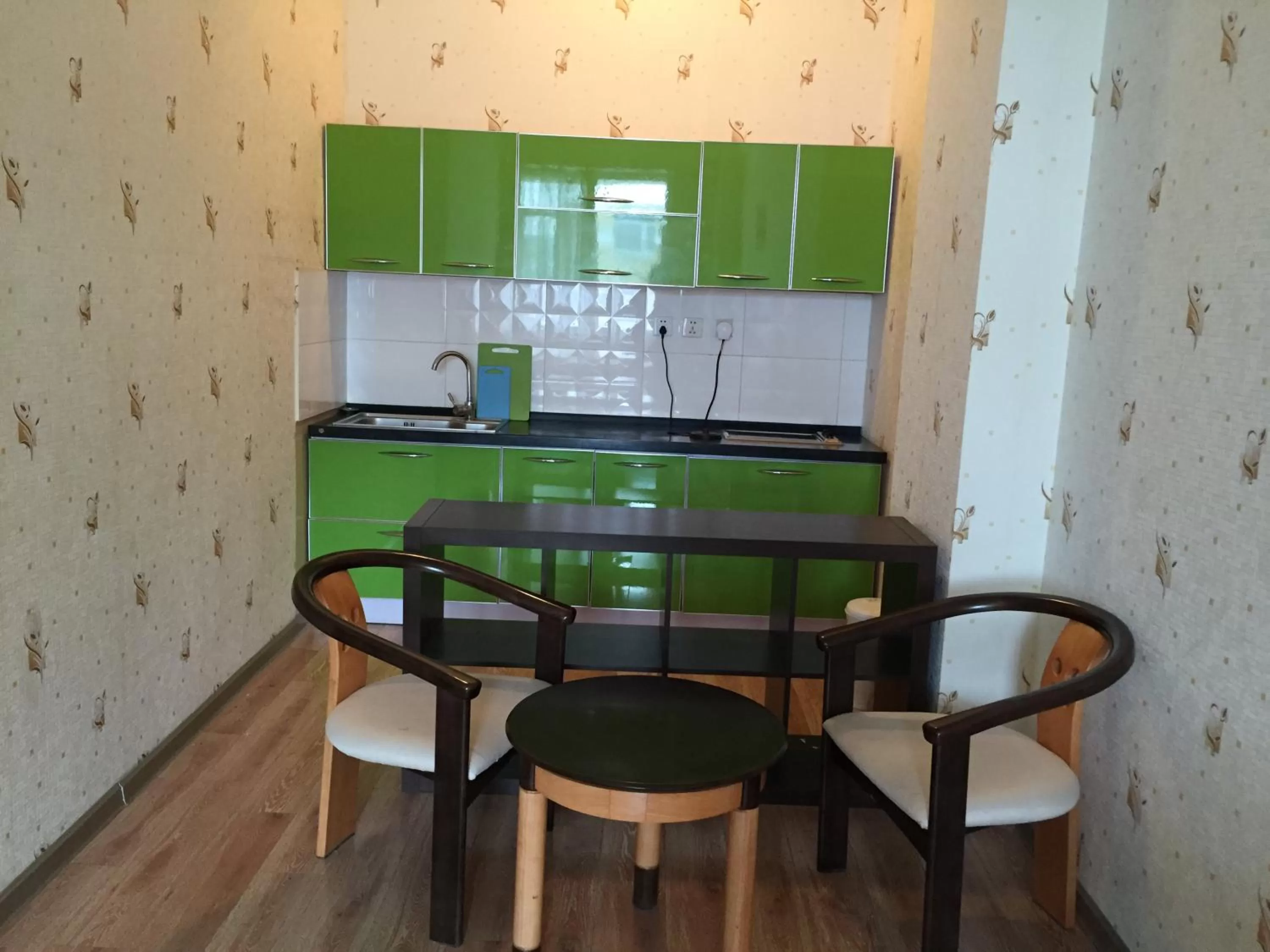 Dining area, Kitchen/Kitchenette in Tsolmon's Serviced Apartments