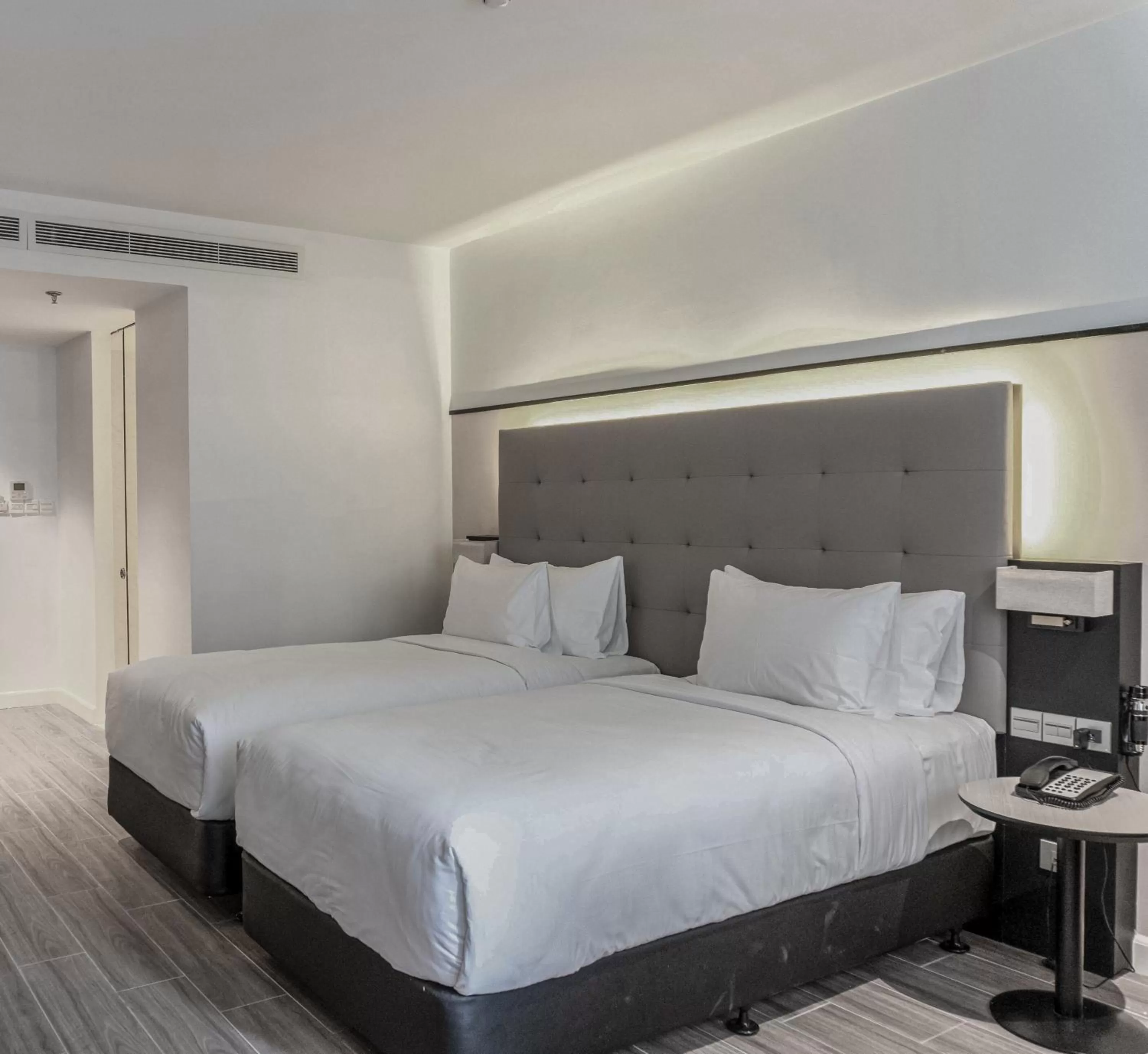 Bed in M Village Hotel Tôn Thất Đạm