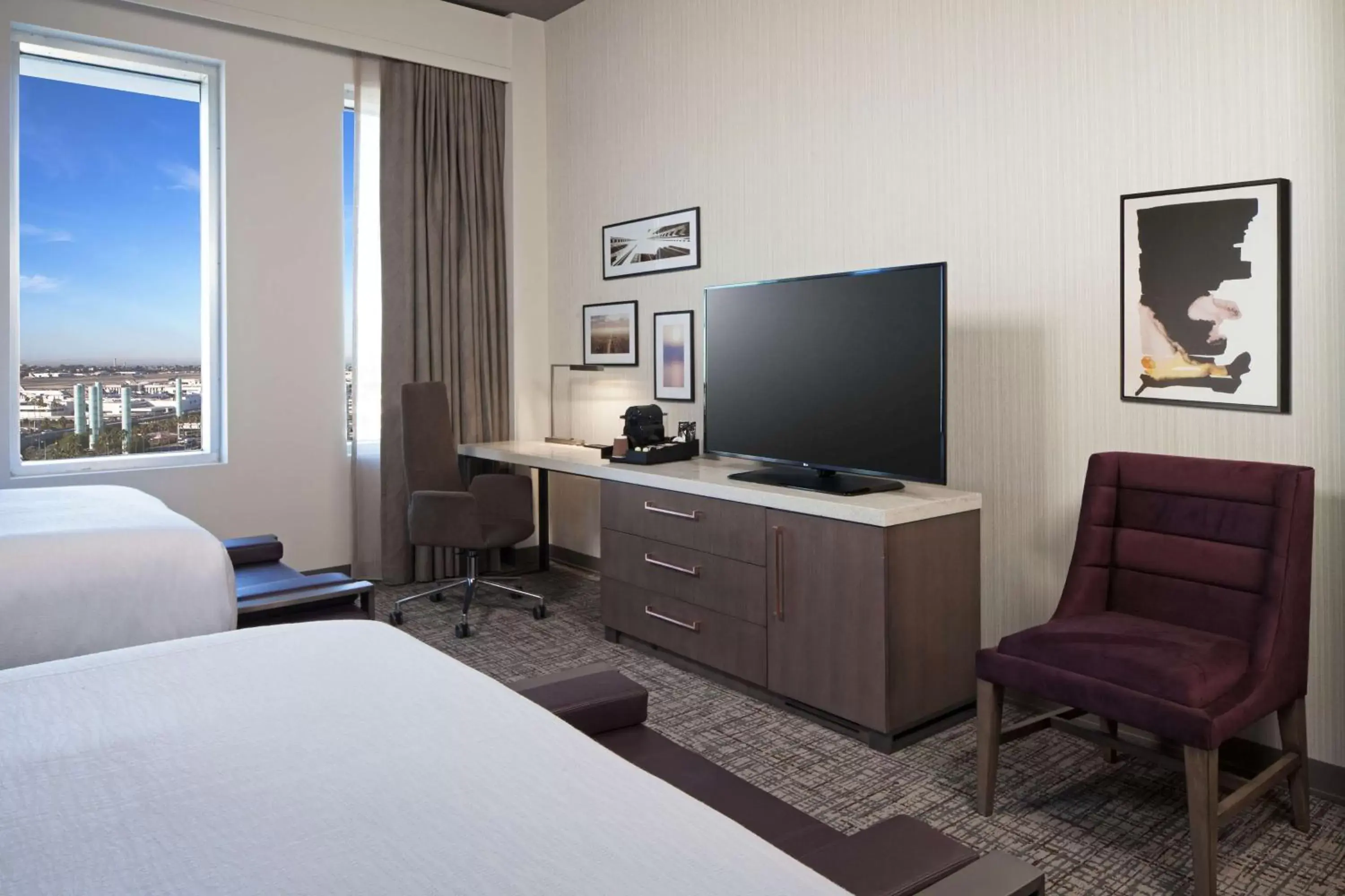 Deluxe Queen Room with Two Queen Beds and Roll-In Shower - Mobility Access in H Hotel Los Angeles, Curio Collection By Hilton Deluxe Queen Room with Two Queen Beds and Roll-In Shower - Mobility Access in H Hotel Los Angeles, Curio Collection By Hilton