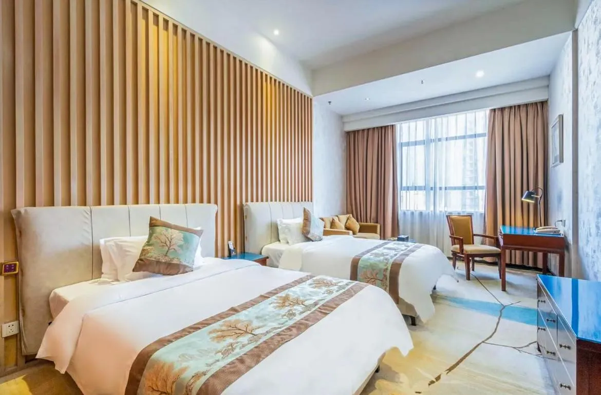 Bed in Guangzhou Nuomo International Hotel-Canton Fair Free Shuttle Bus