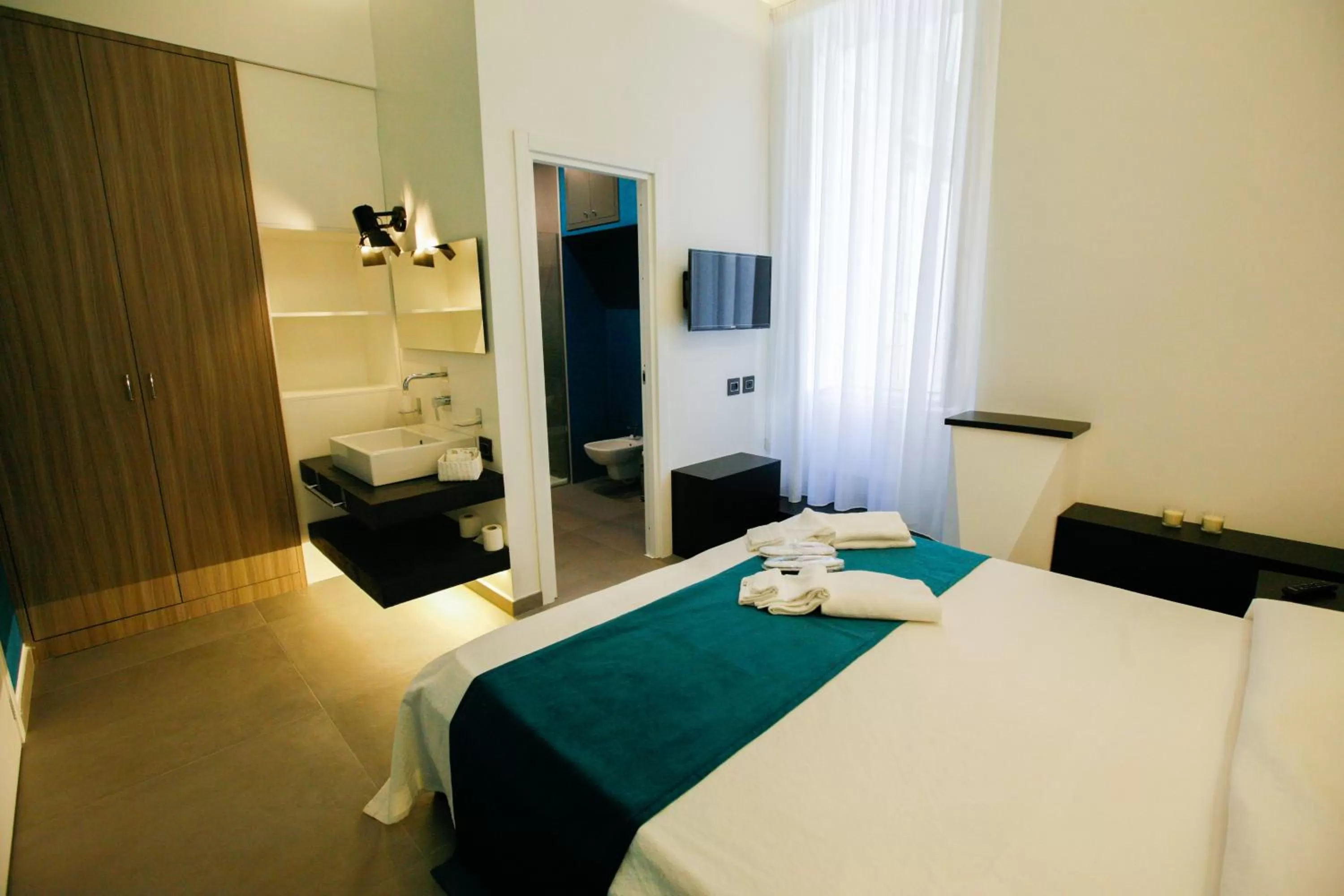 Bed in Relais Piazza Del Plebiscito B&B