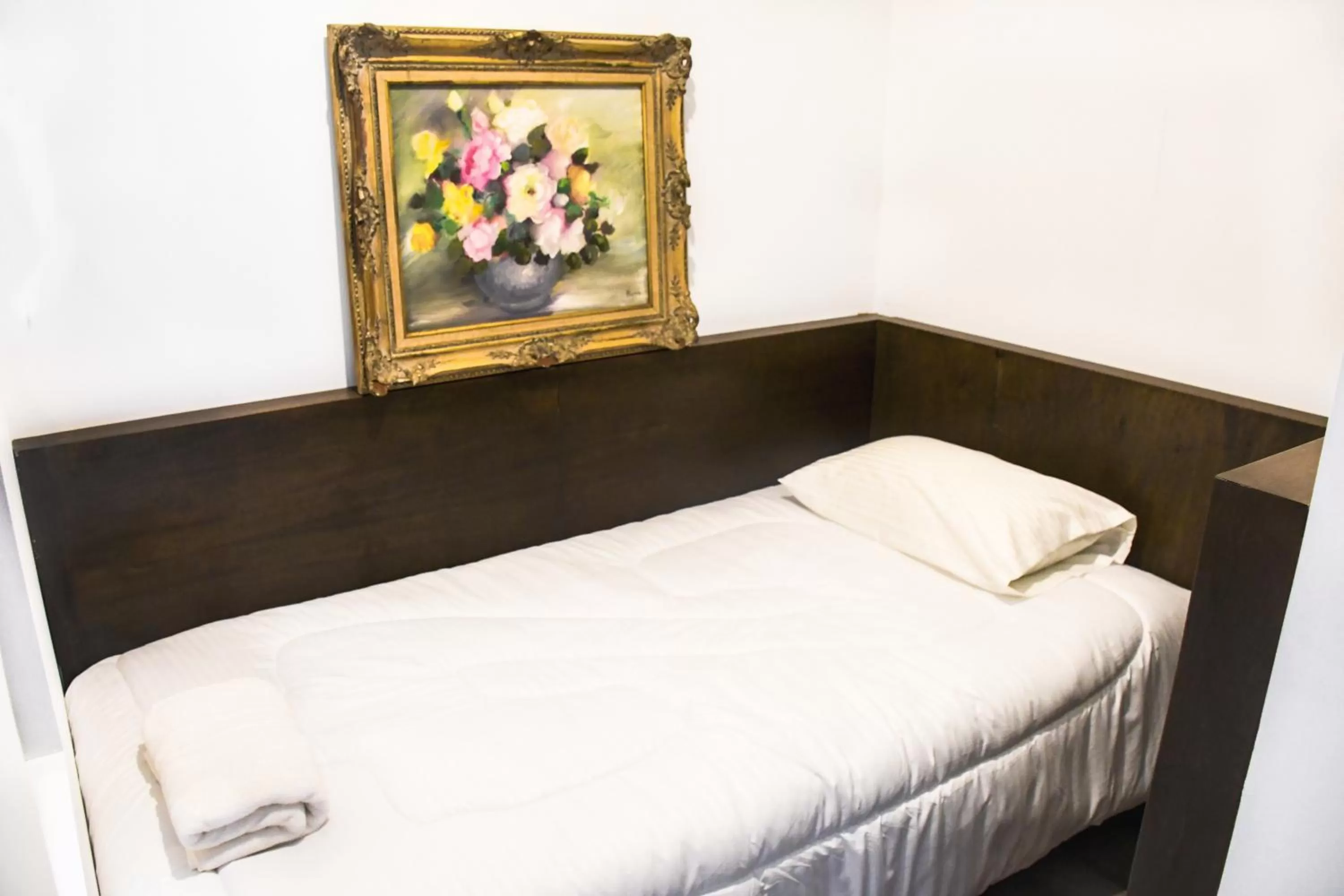 Bed in Hotel Museo San Moritz