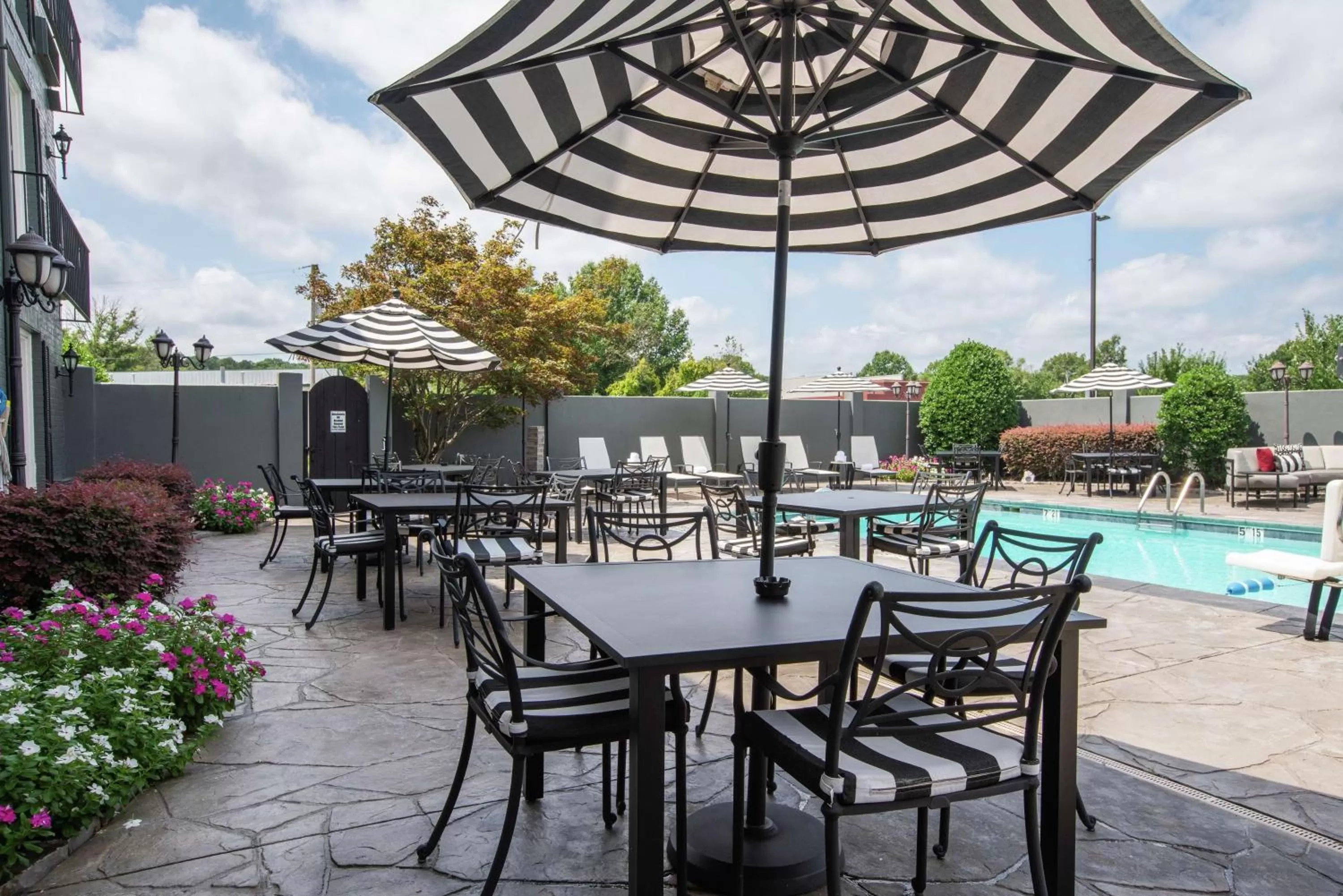 Pool view in The Burgundy Hotel, Tapestry Collection by Hilton