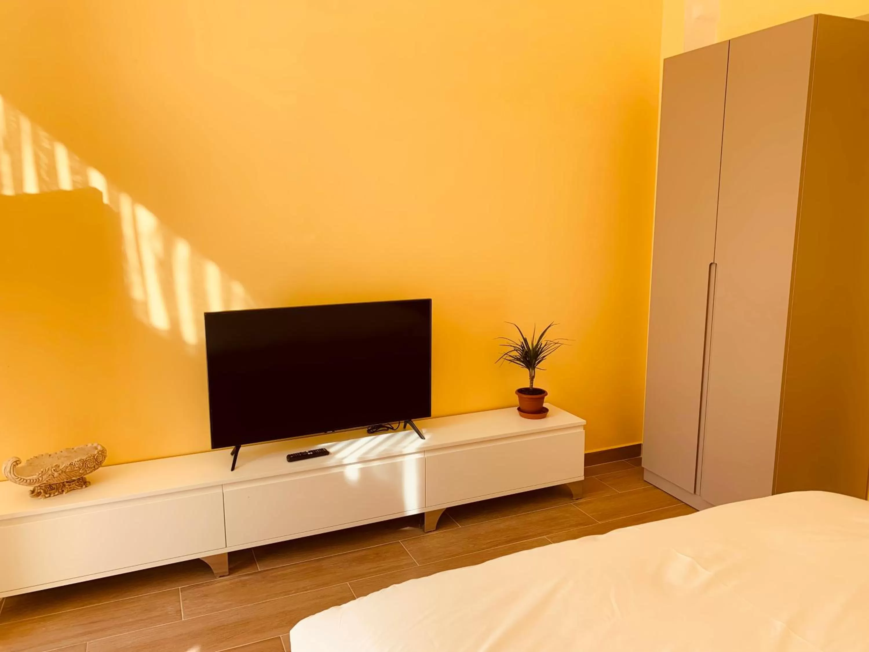 TV/Entertainment Center in Auto Tana Guest House