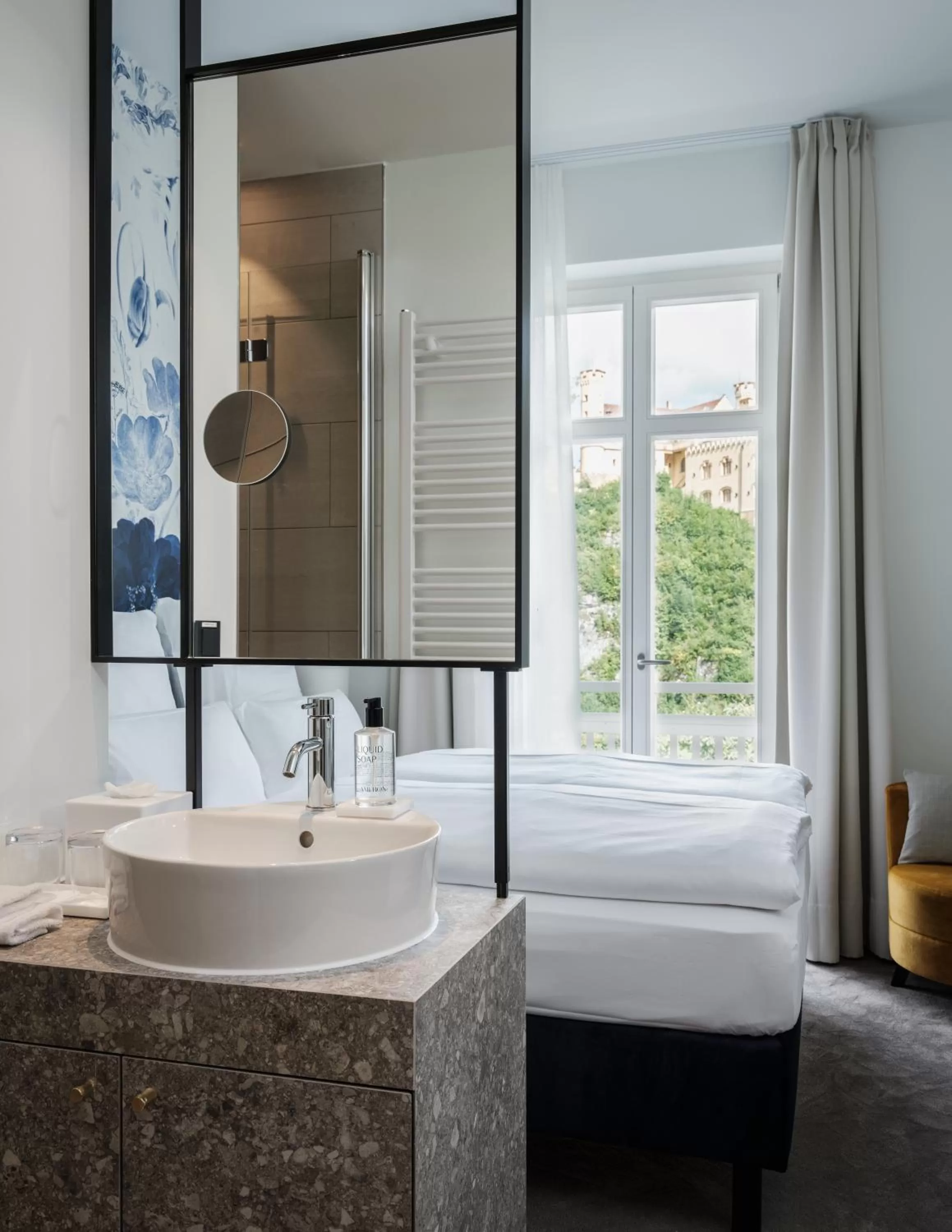 Bathroom, Bed in AMERON Neuschwanstein Alpsee Resort & Spa