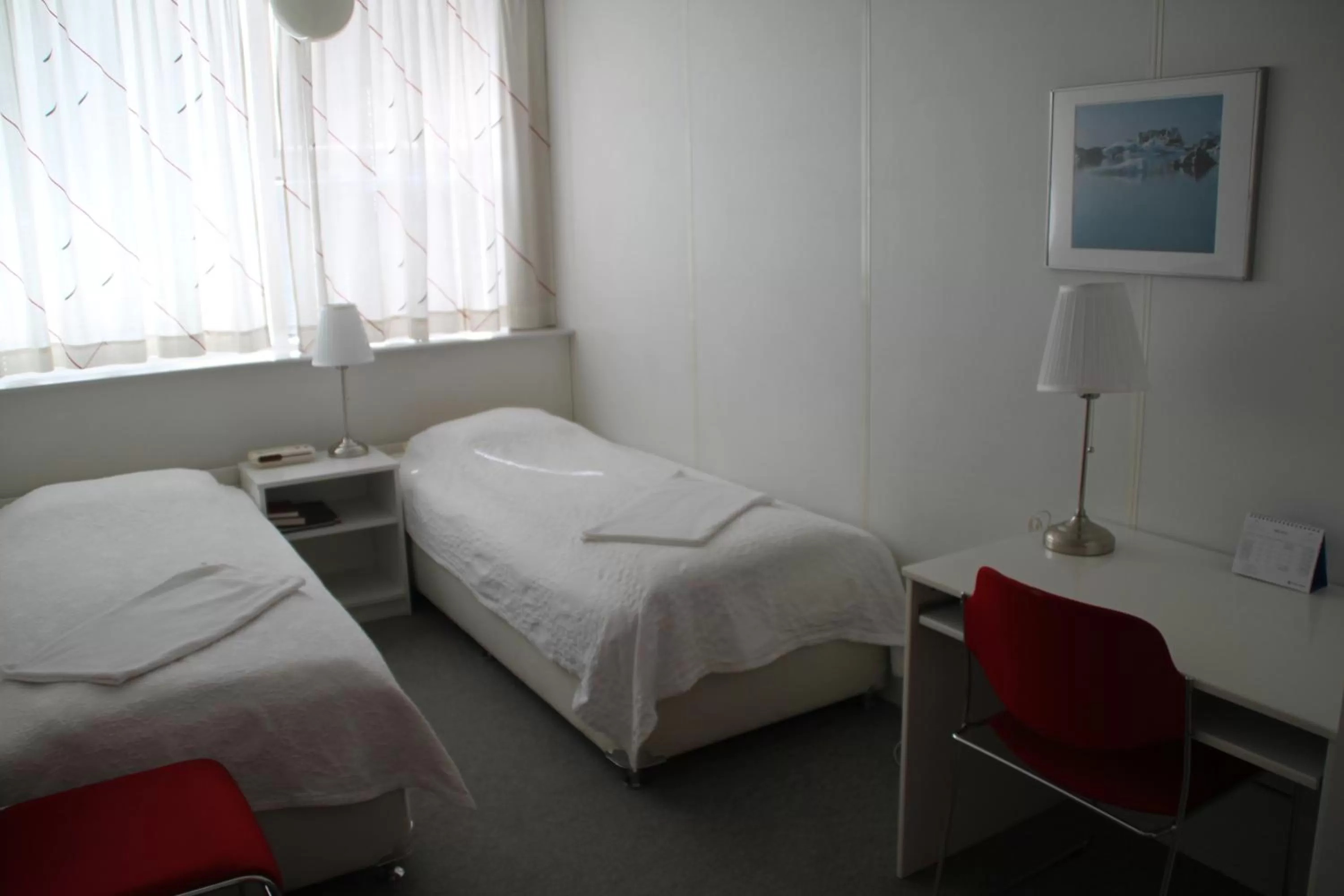 Bed in 101 Guesthouse Hotel