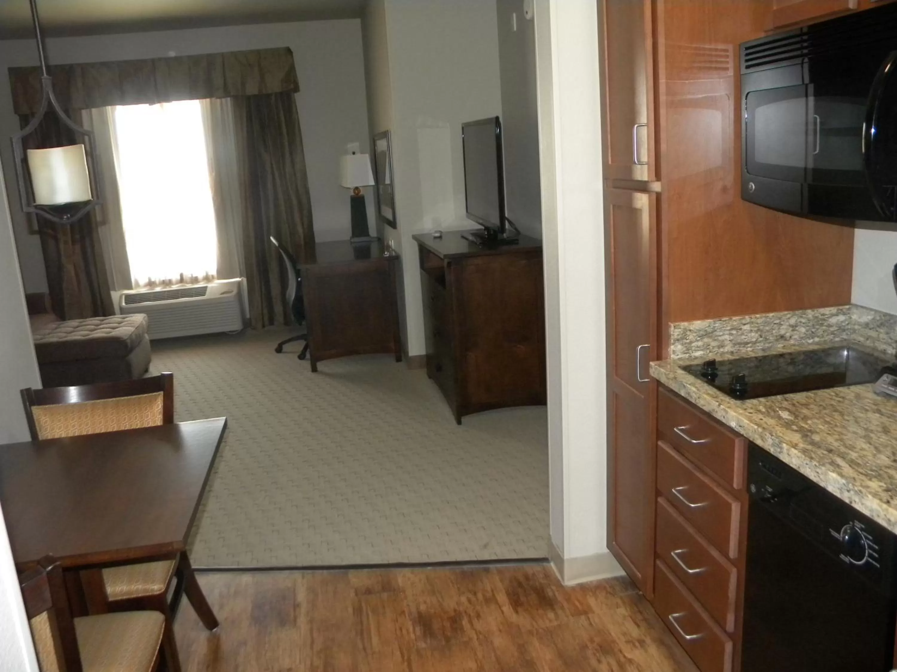 Kitchen or kitchenette in Teddy's Residential Suites Watford City
