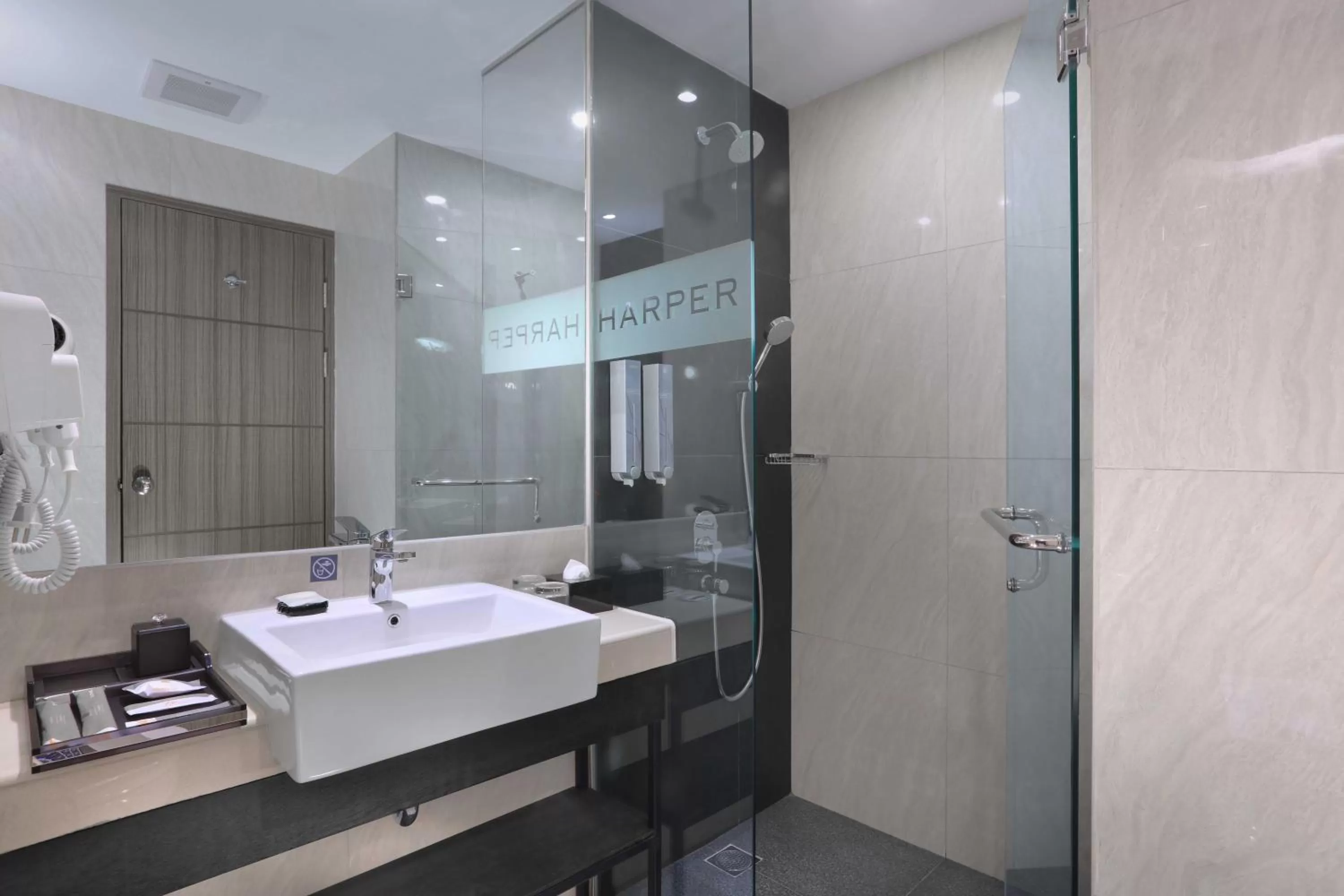 Bathroom in Harper Wahid Hasyim Medan by ASTON