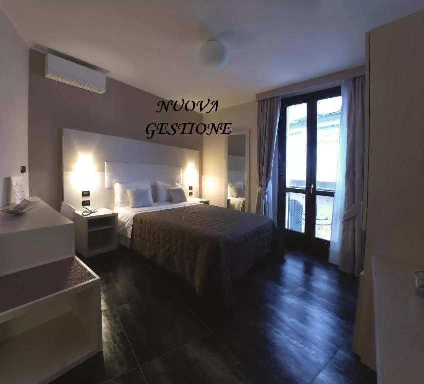 Bed in Hotel La Meridiana