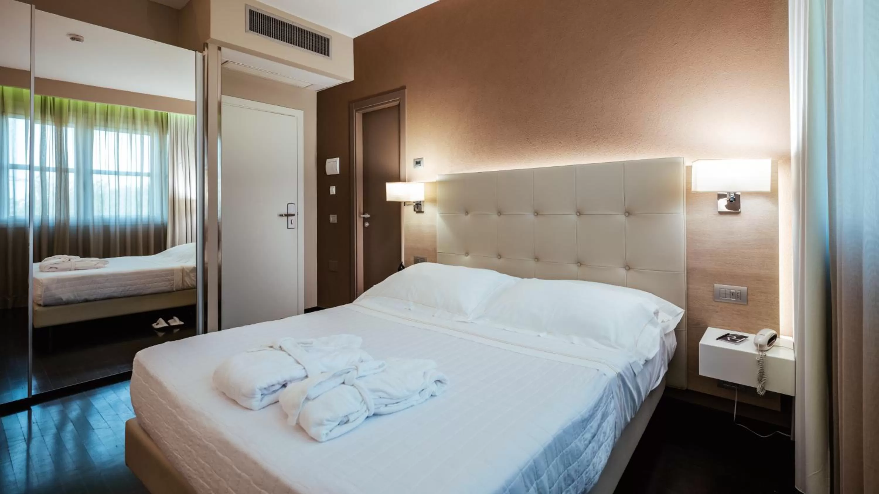 Bedroom, Bed in Raffaello Hotel & Mooka Restaurant