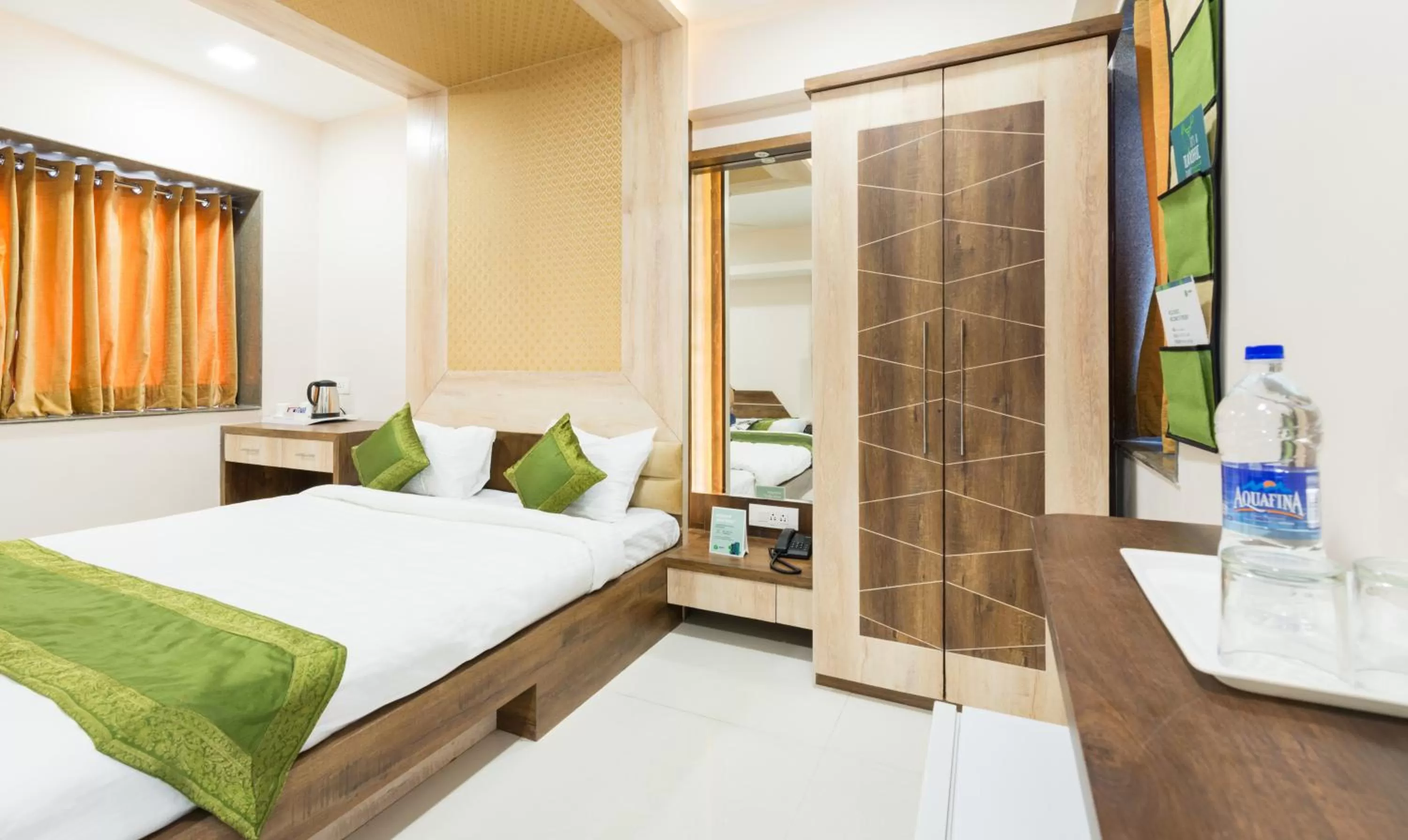 Bed in The Tripti Hotel & Banquets