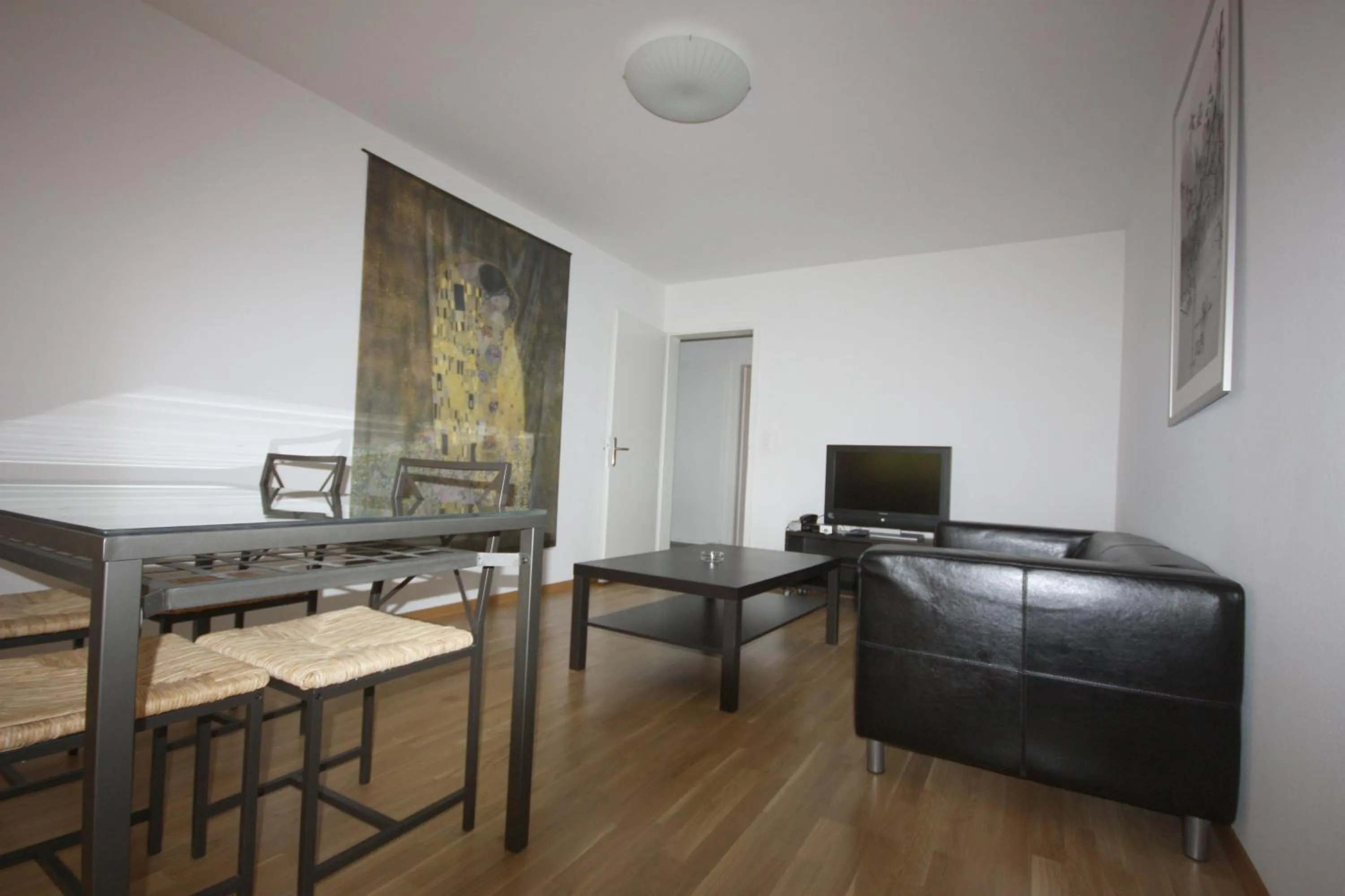 Living room, TV/Entertainment Center in Swiss Star Residences - contactless self check-in