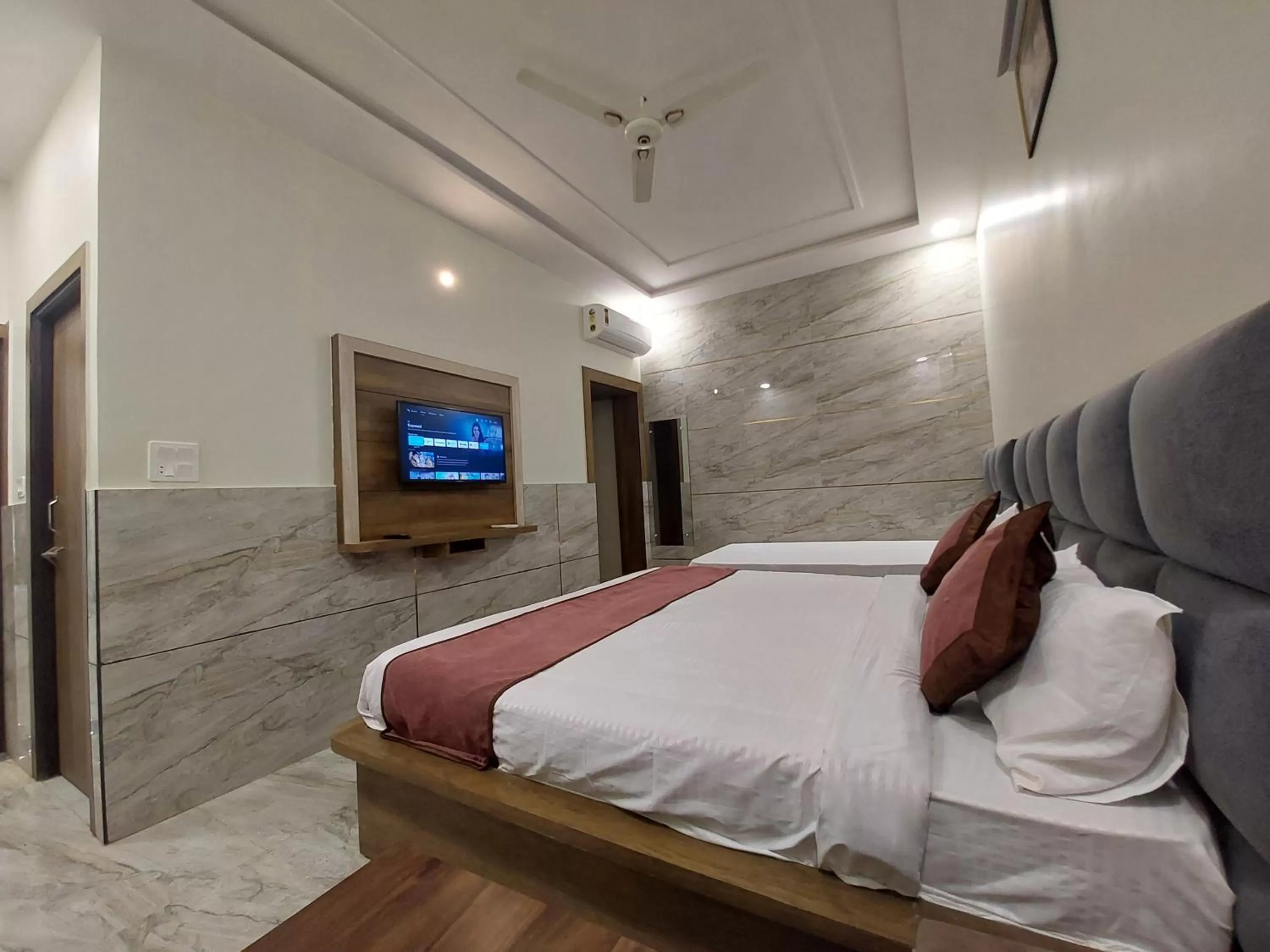 Bed in Taj Nice Point Manage by Taj Sunrise Group