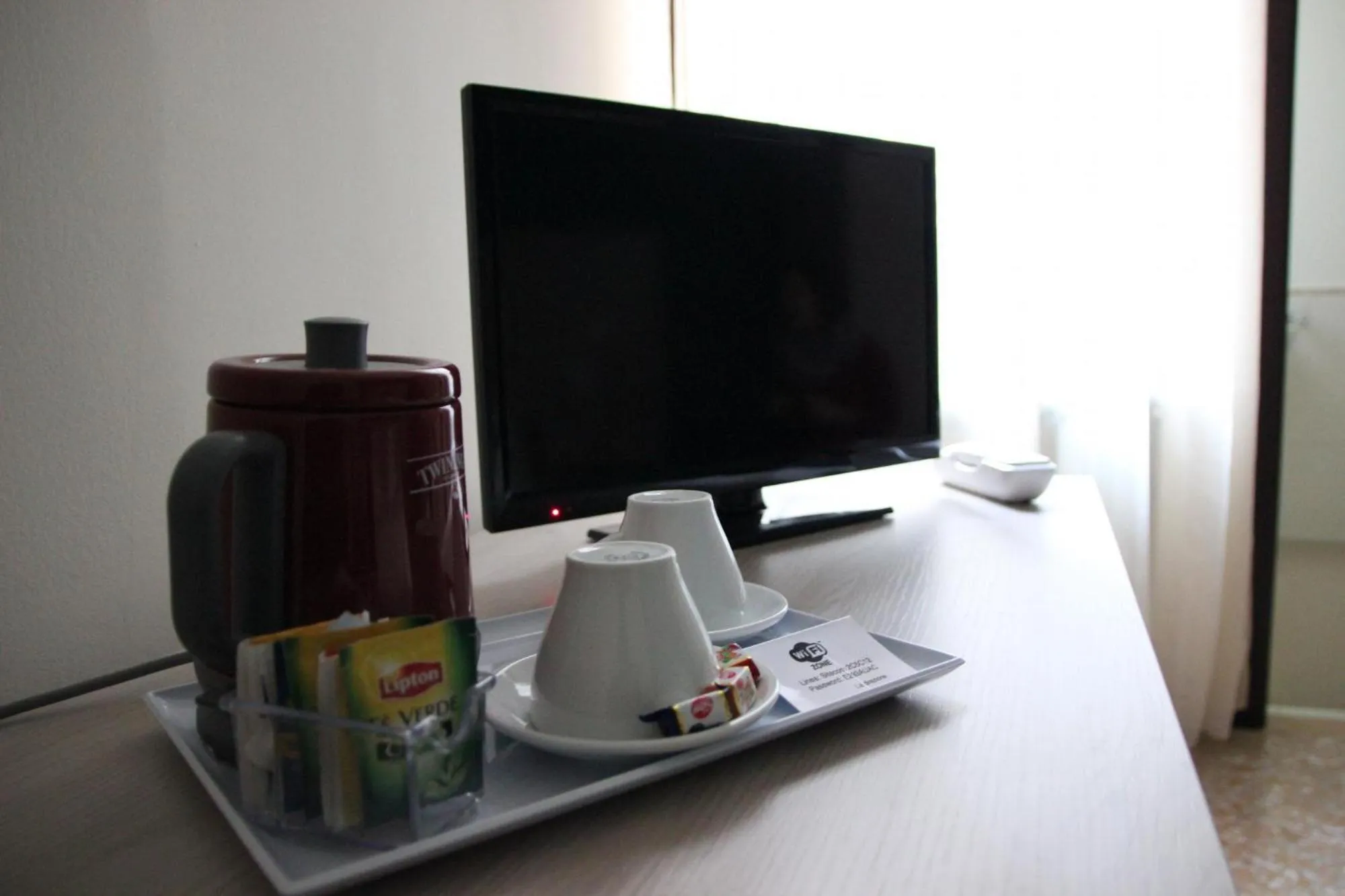 TV and multimedia in Il Quadrifoglio Room& Suite