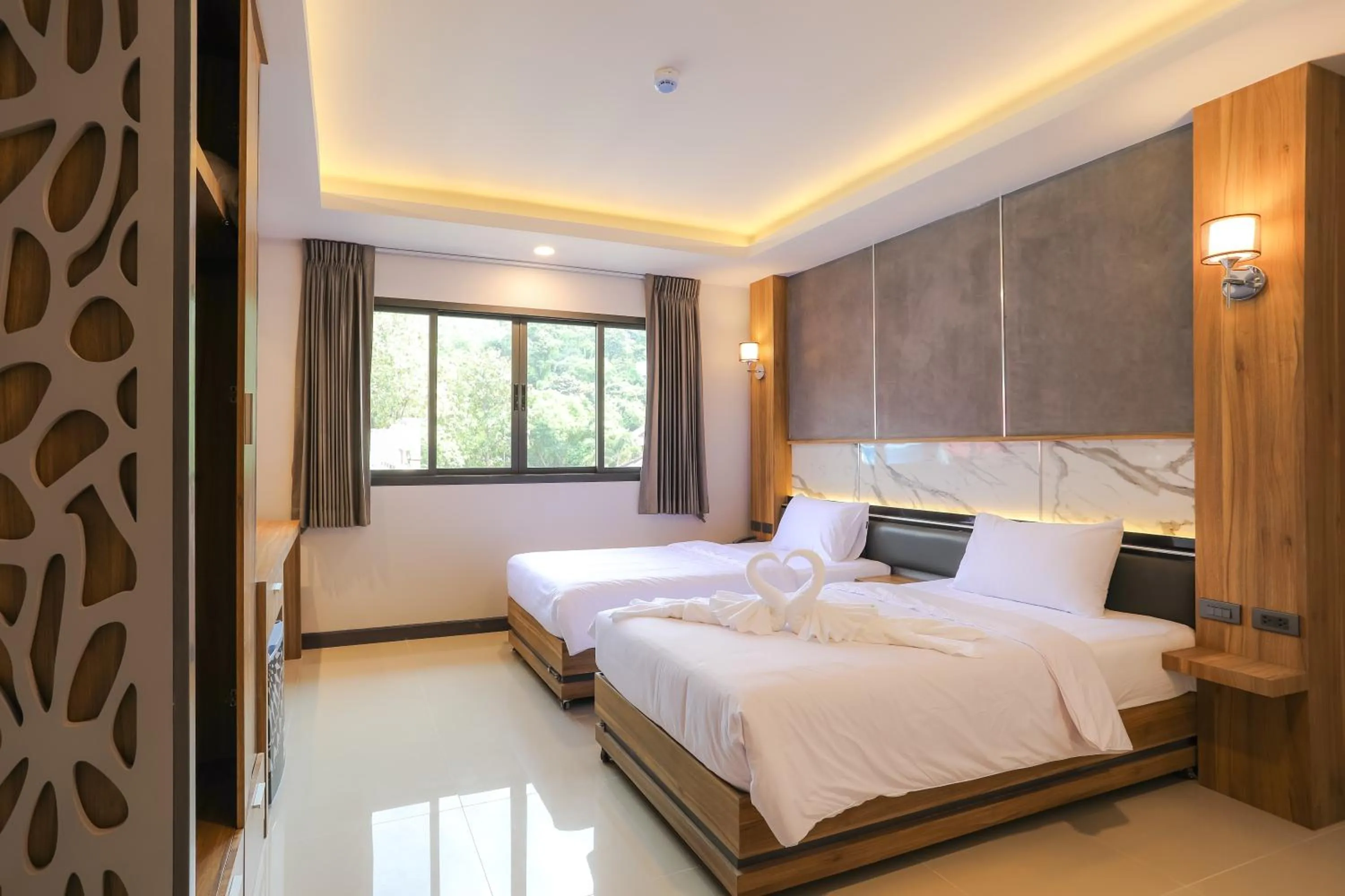 Bed in The Mantra Hotel Kata Noi