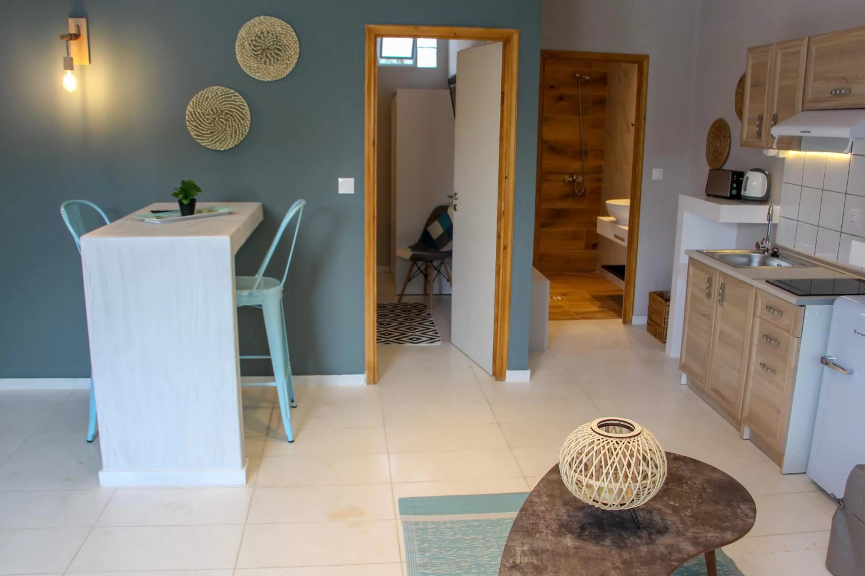 Seating area in Lamprini's Deluxe Studios