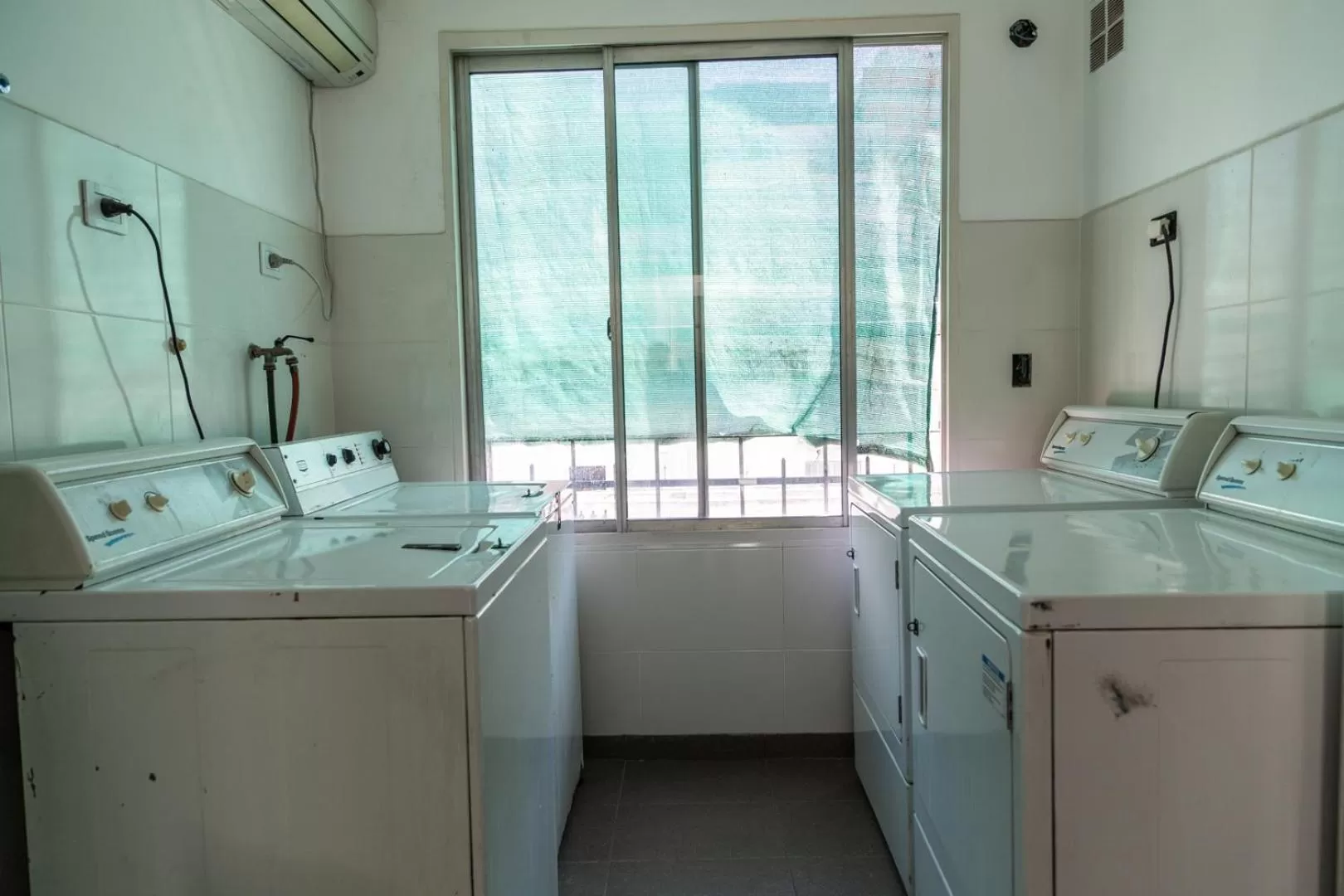 laundry in Loft Argentino Apart Buenos Aires