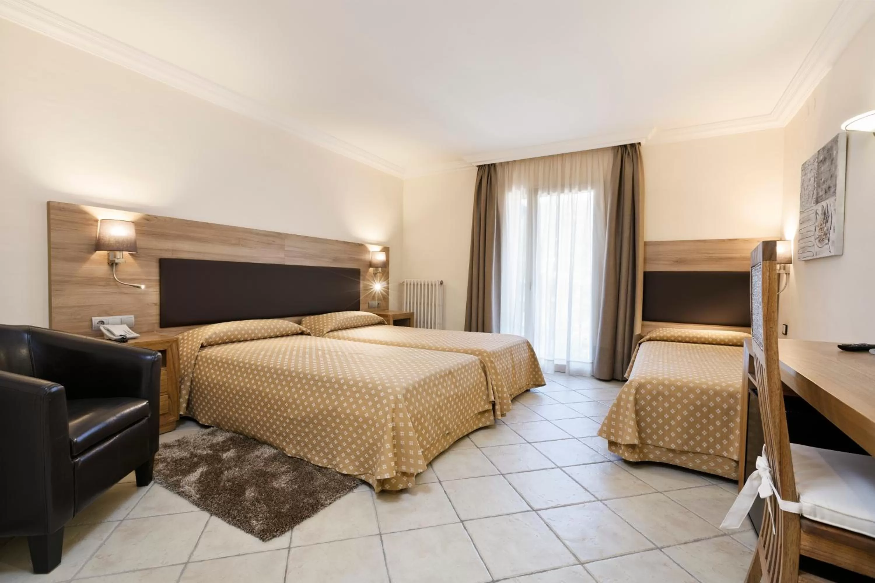 Photo of the whole room, Bed in Hotel Cap Roig & Spa by Brava Hoteles