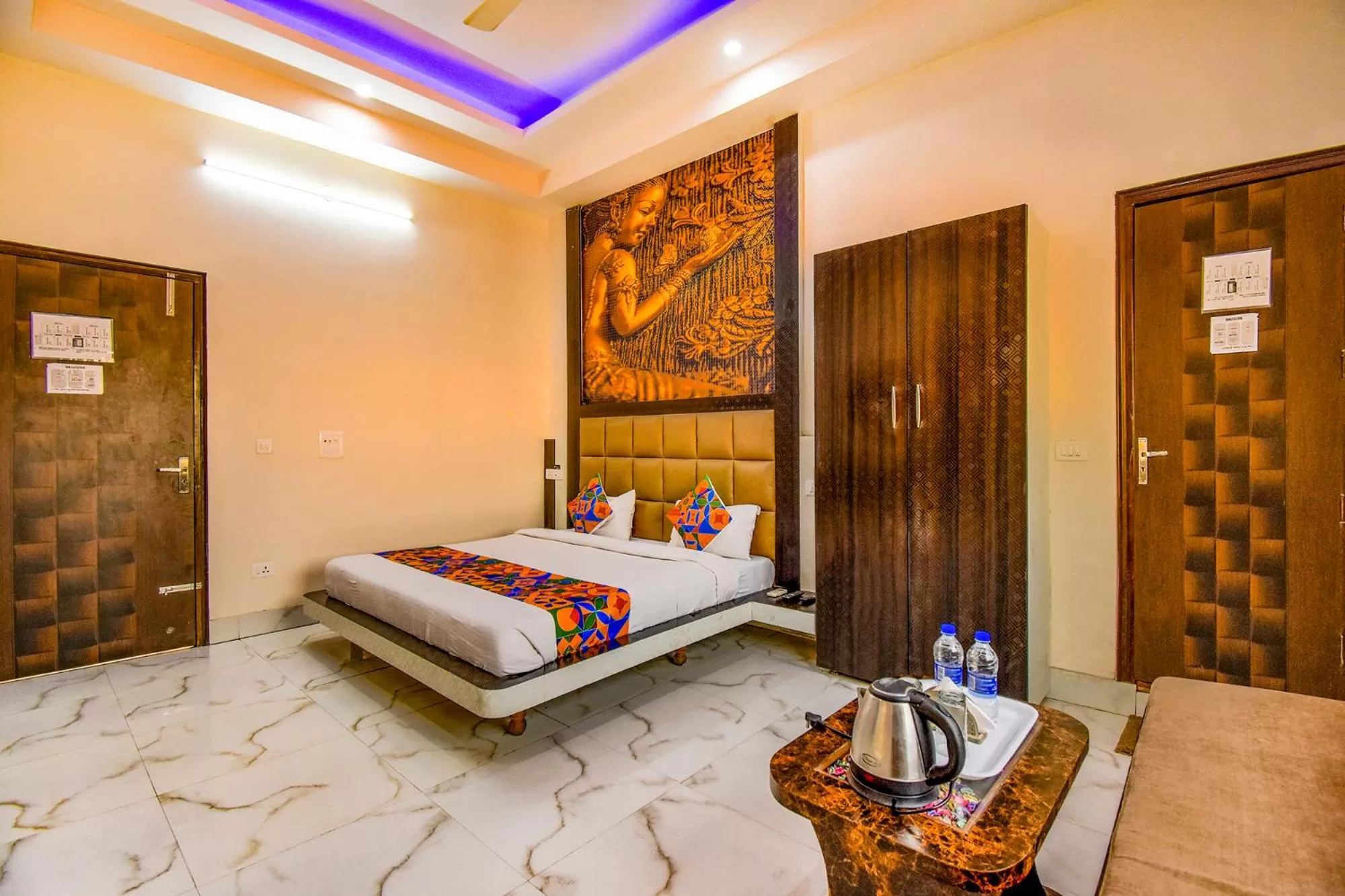 Bed in FabHotel Prime Sumanglam