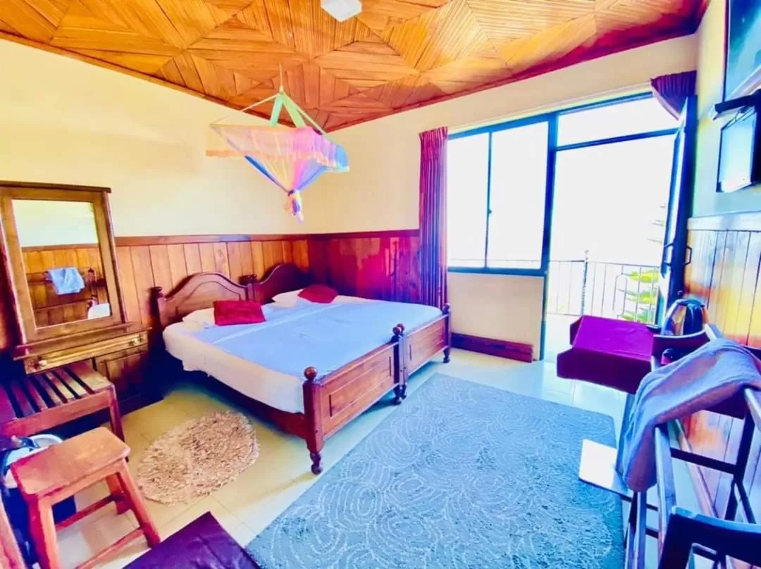 Bed in Srilak View Holiday Inn