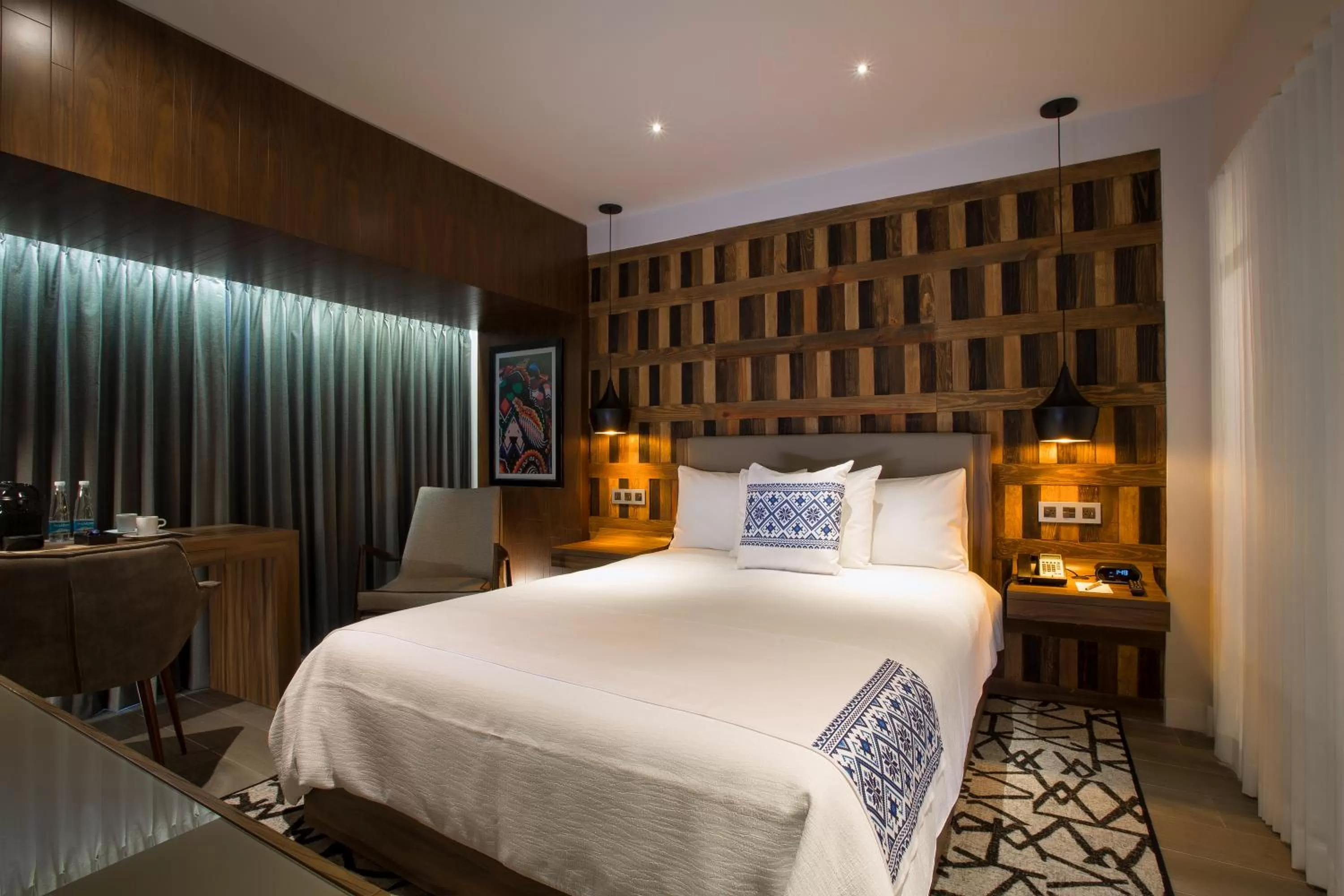 Bed in Hotel Indigo Guadalajara Expo by IHG