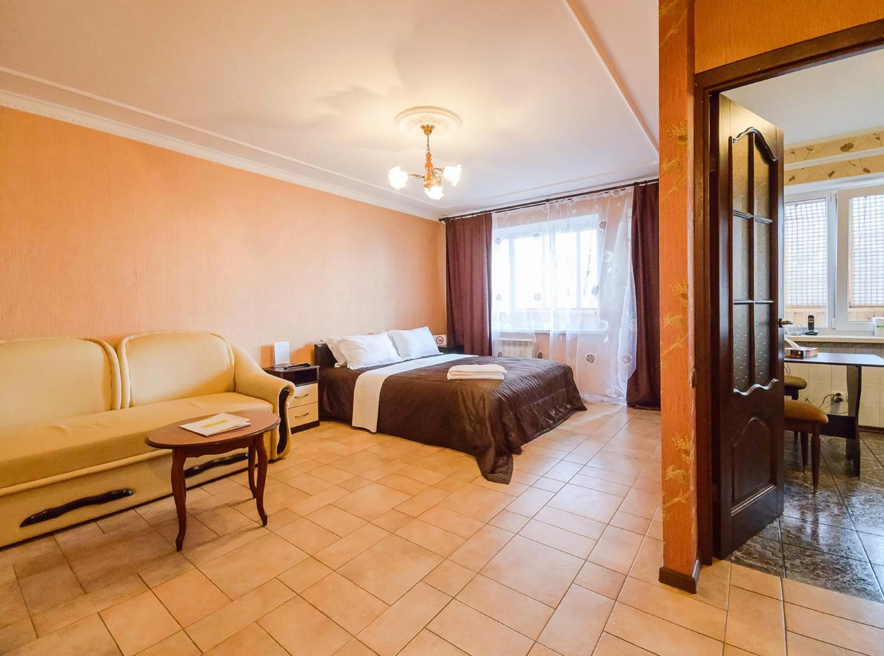 Seating area, Bed in Partner Guest House