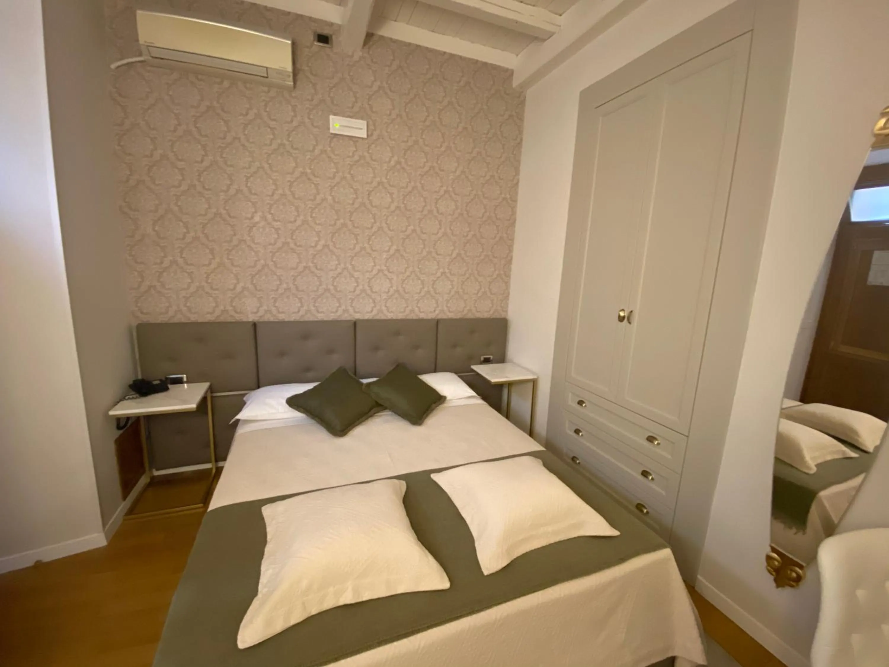Bed in Condotti Rooms