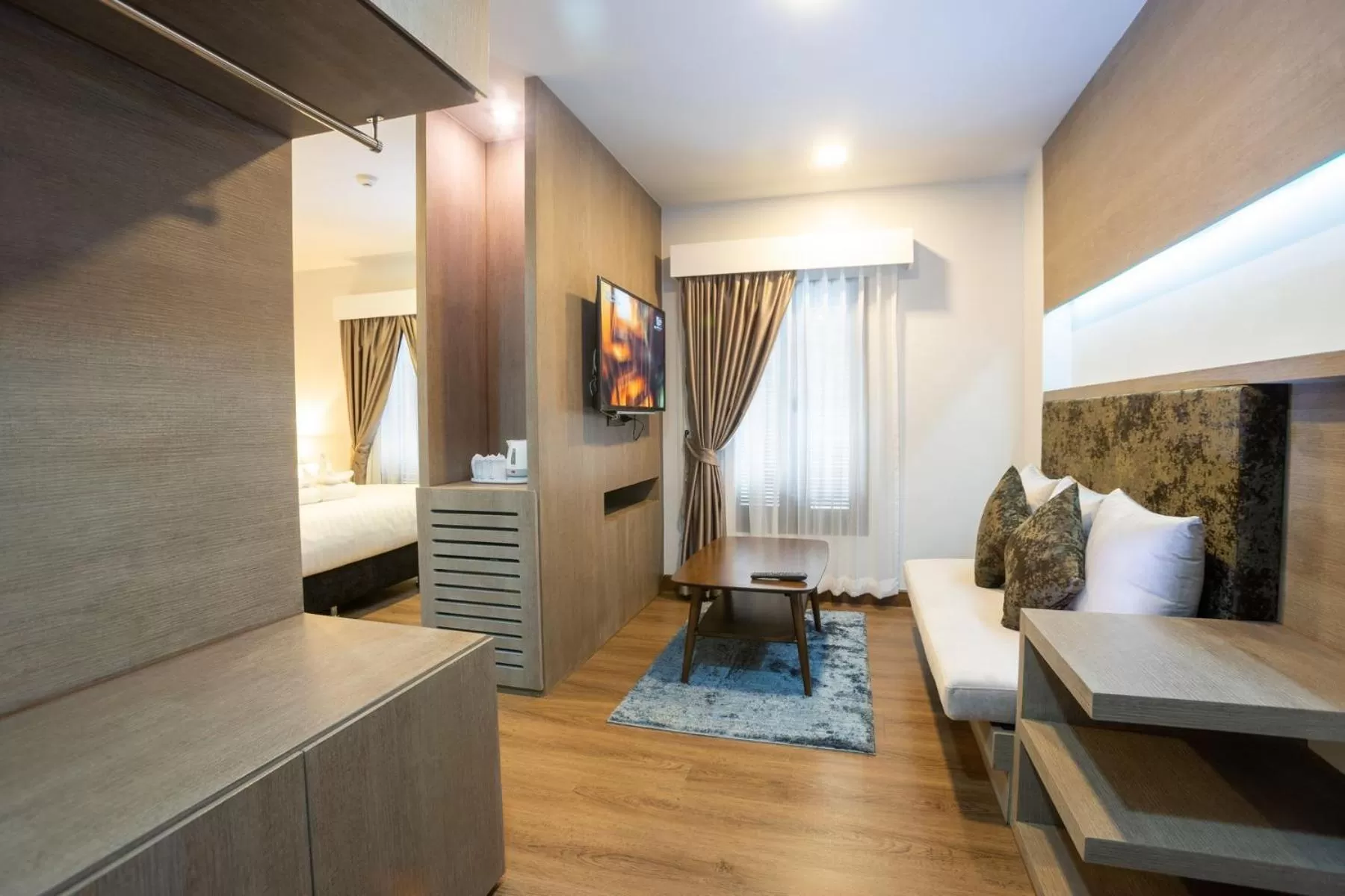 Living room, Bed in Marigold Lanna