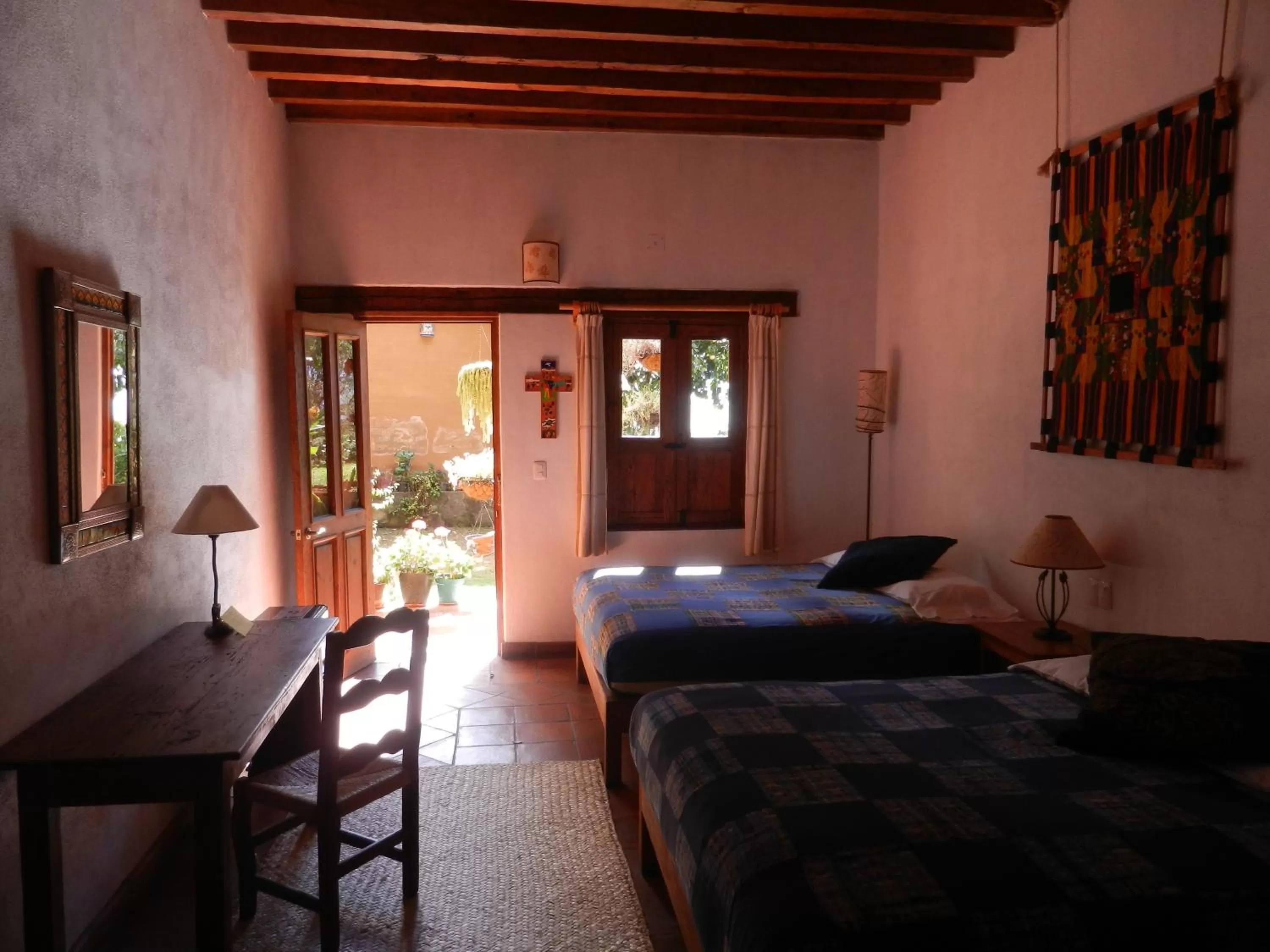 Photo of the whole room, Bed in Posada Yolihuani