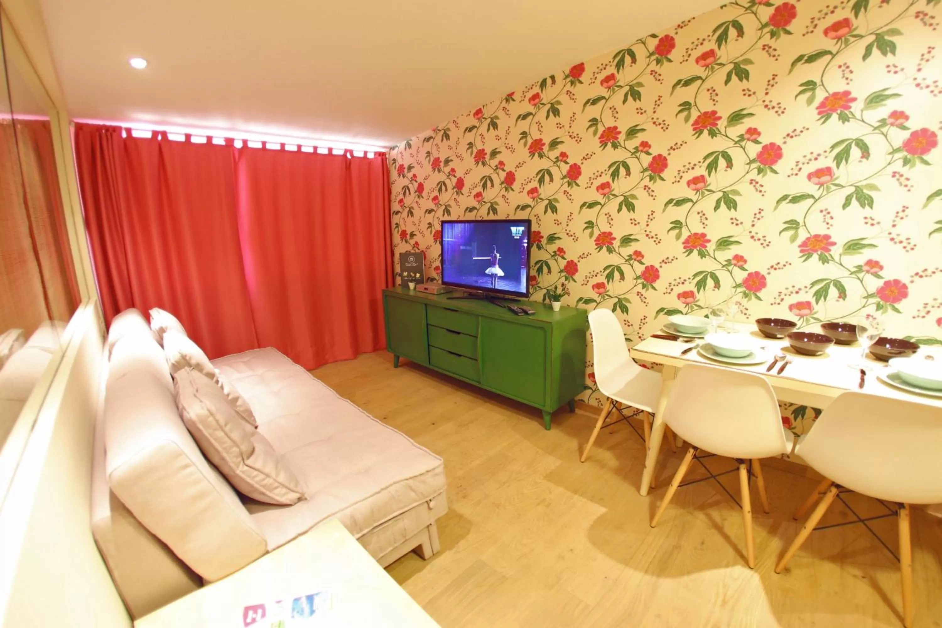 TV and multimedia in Central Apartments Integrated Hotel