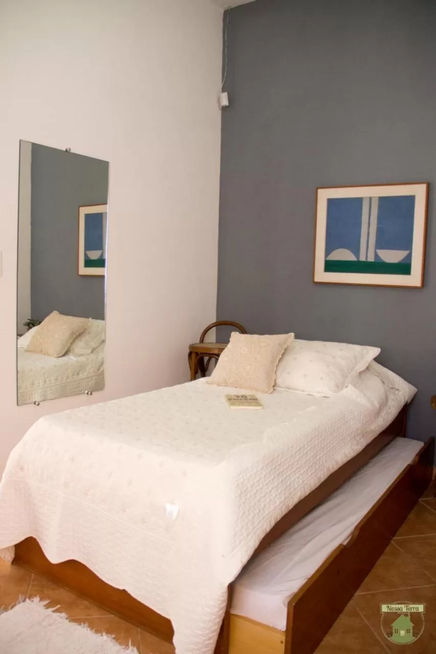 Bed in Pousada Nossa Terra