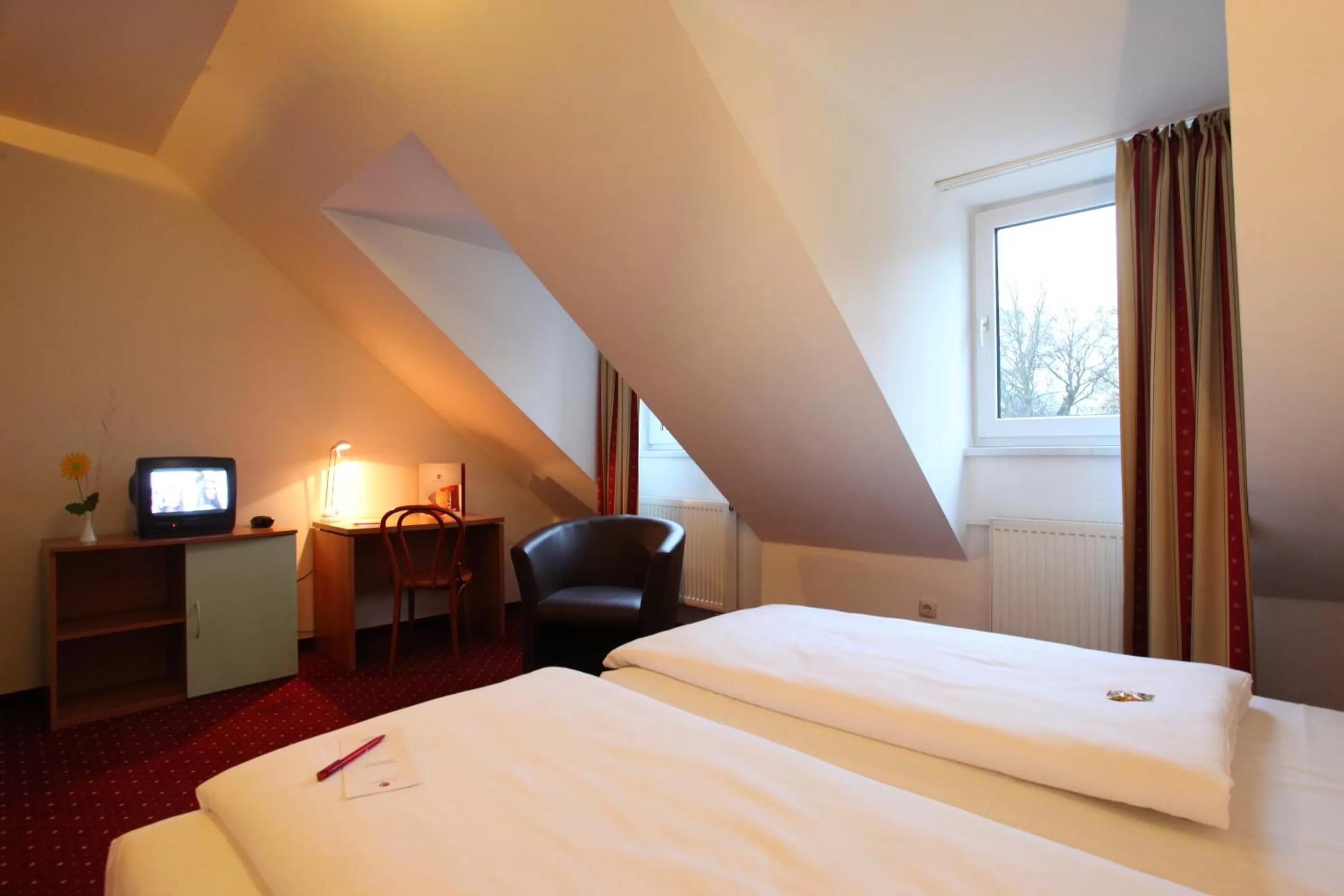 Bed in AZIMUT Hotel Erding