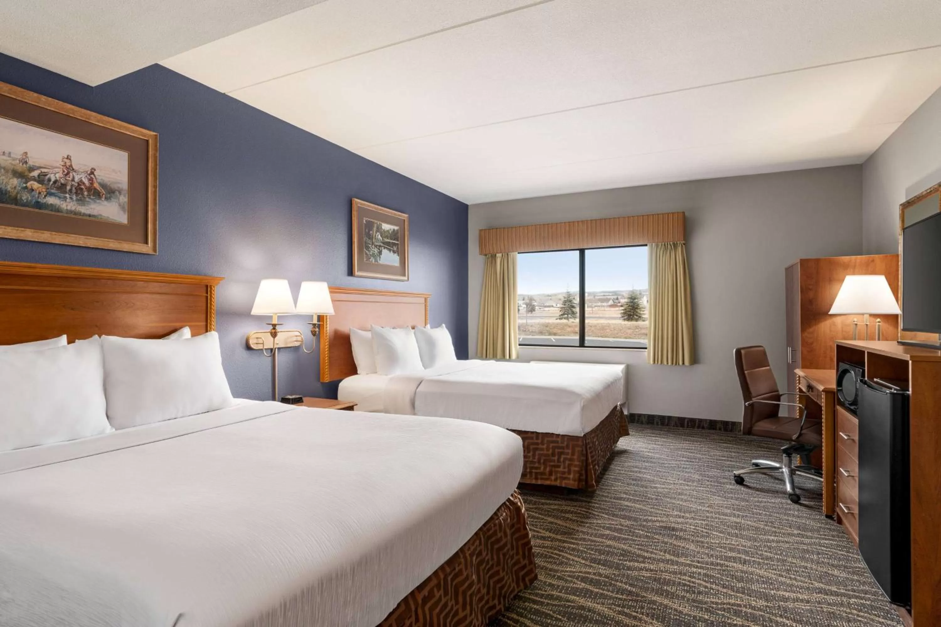 Photo of the whole room, Bed in AmericInn by Wyndham Laramie Near University of Wyoming