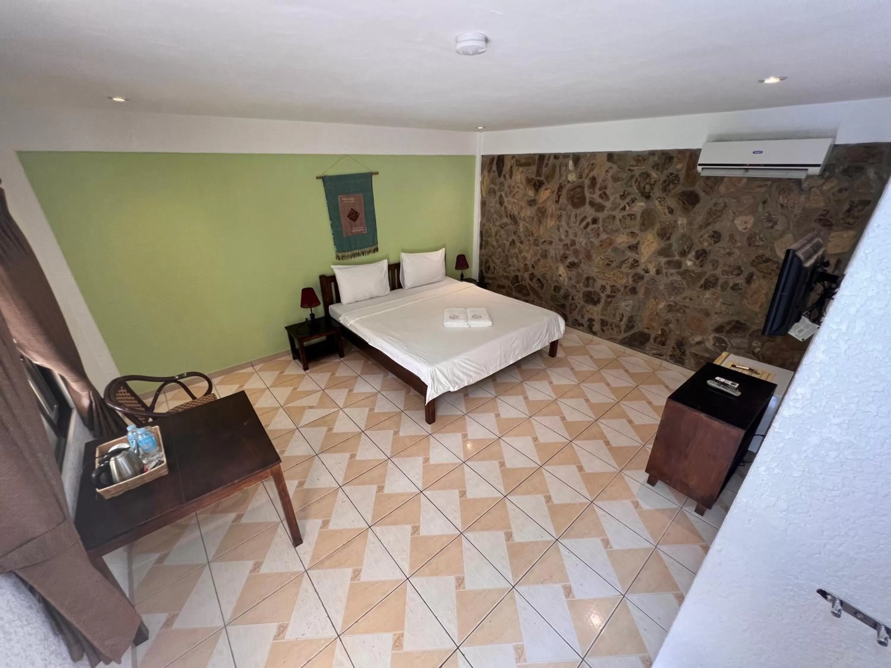 Bed in Alona Swiss Resort